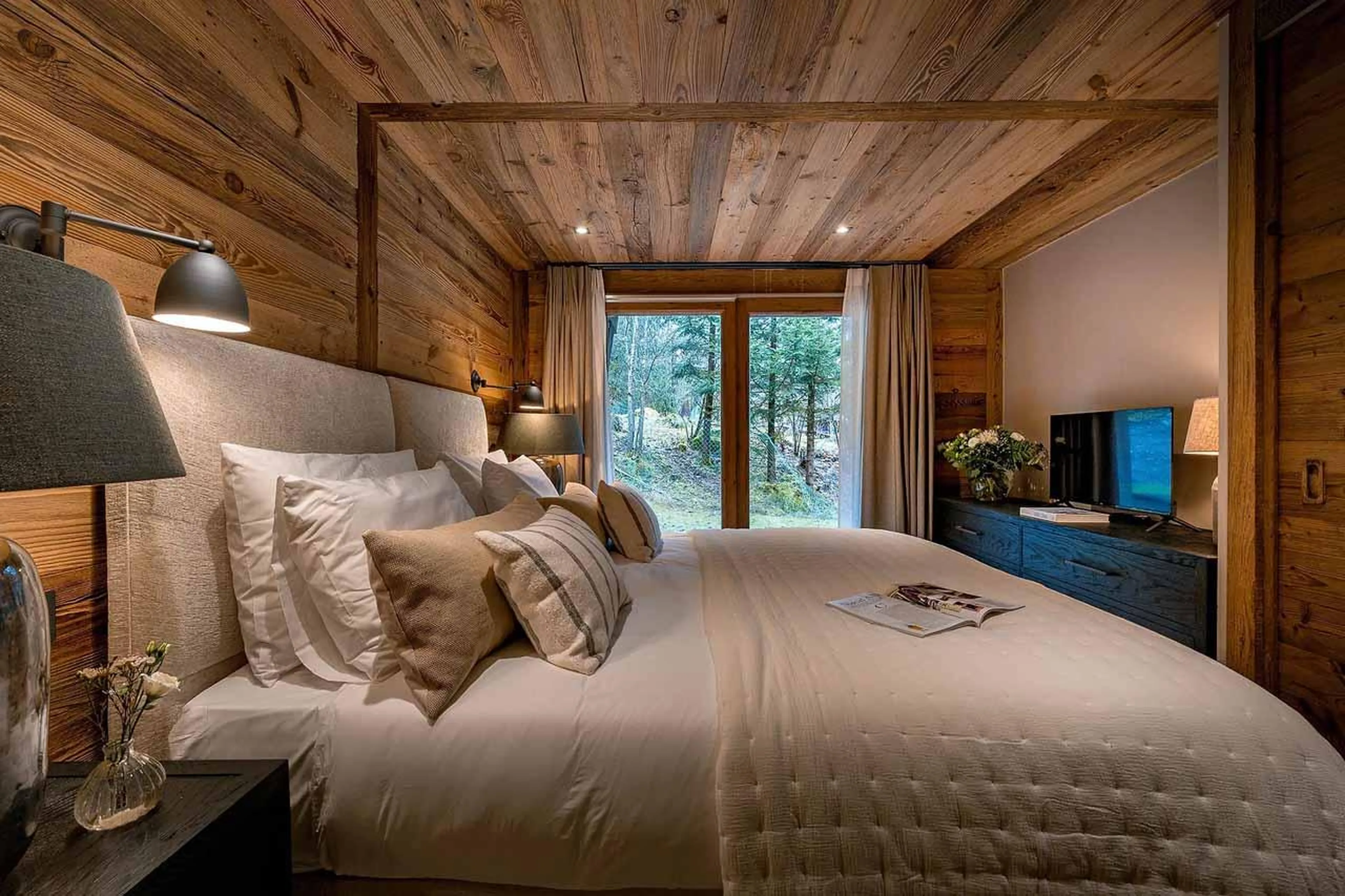 Double bedroom with sliding glass doors in Chalet Lupa, Chamonix