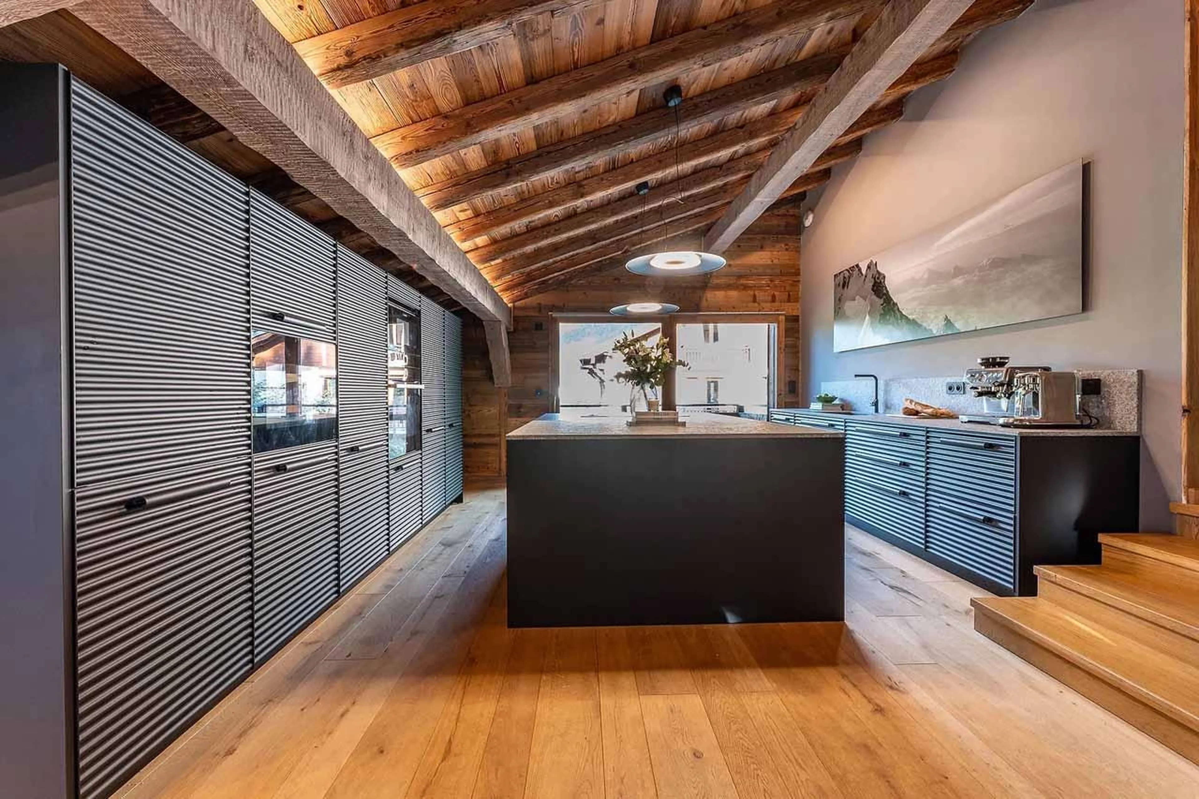 Modern kitchen with central island in Chalet Lupa, Chamonix