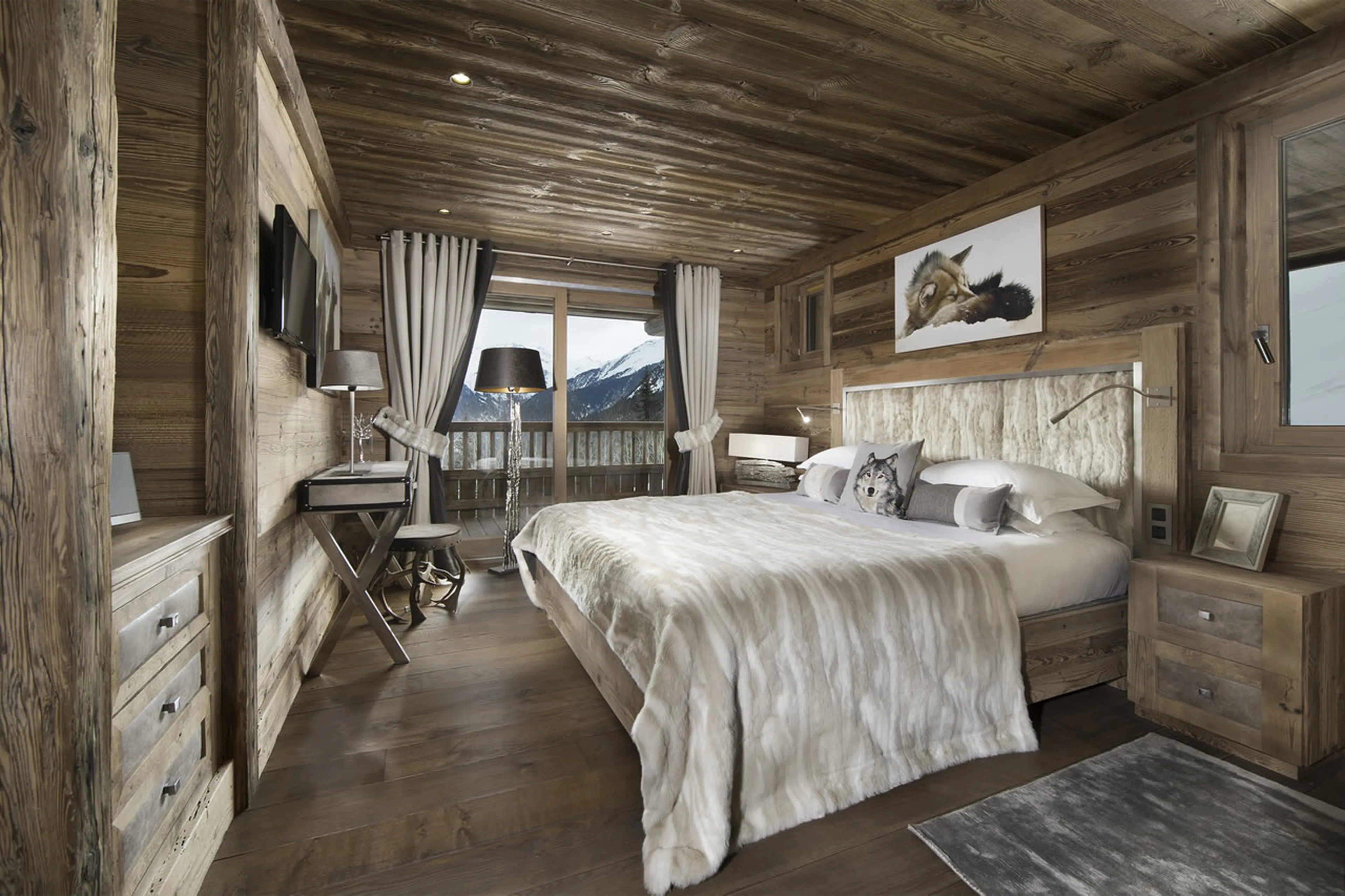 Spacious double bed of master bedroom in Chalet M in Courchevel 1550