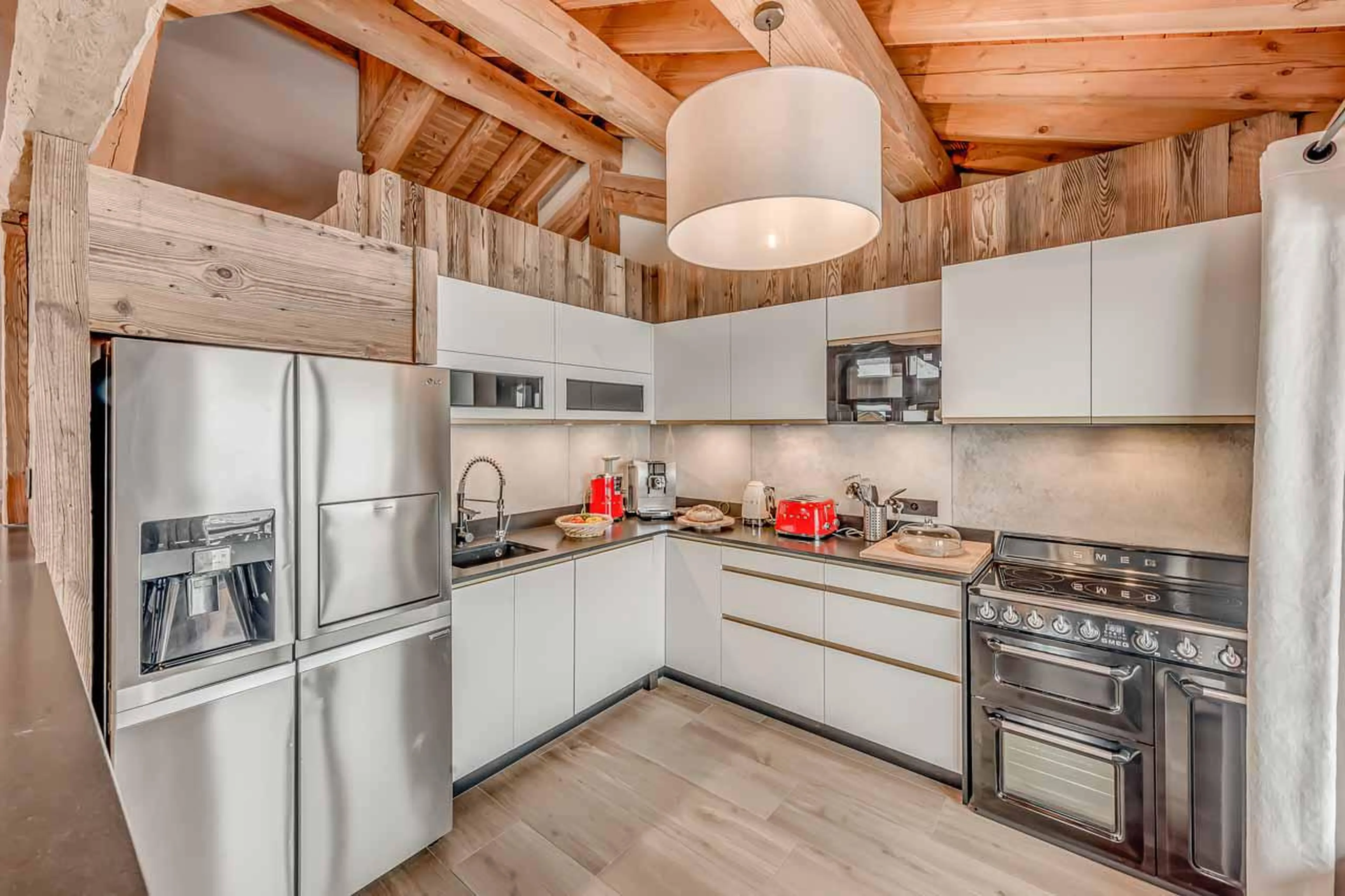 Fully equipped open kitchen space at Chalet Macha in Tignes