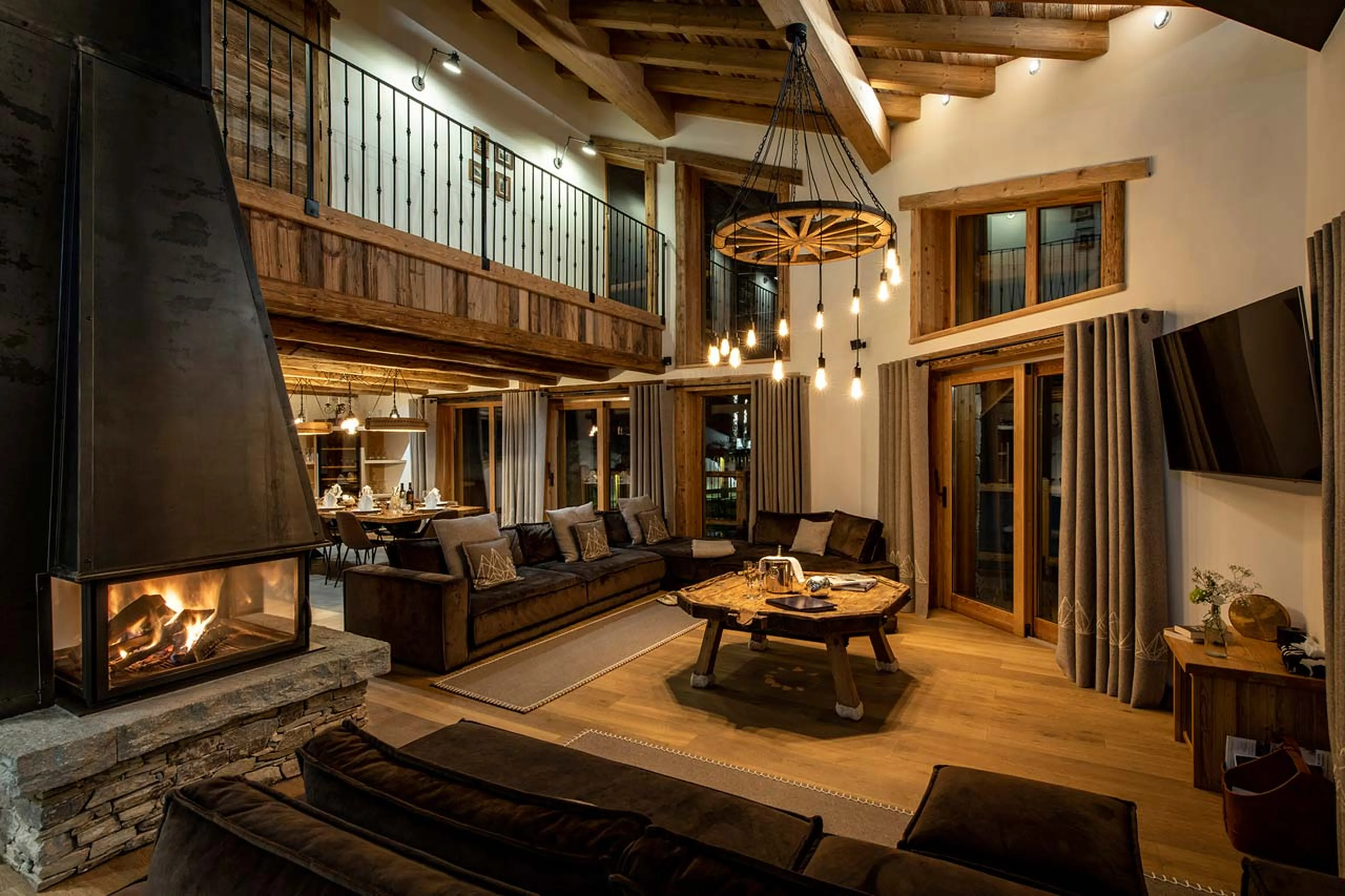 Living area with fireplace at Chalet Machapuchare in Val d'Isere