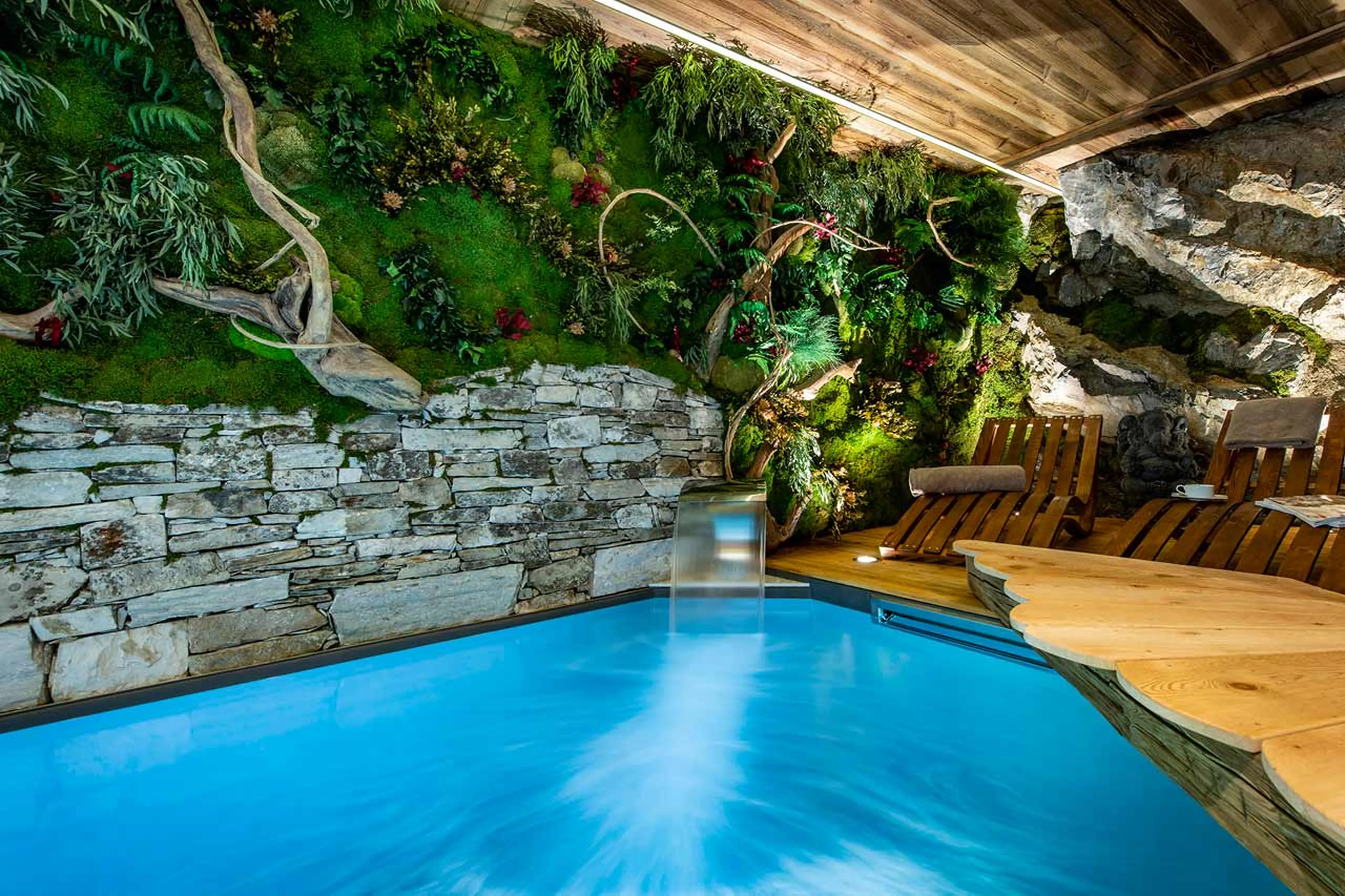 Waterfall feature of swimming pool at Chalet Machapuchare in Val d'Isere