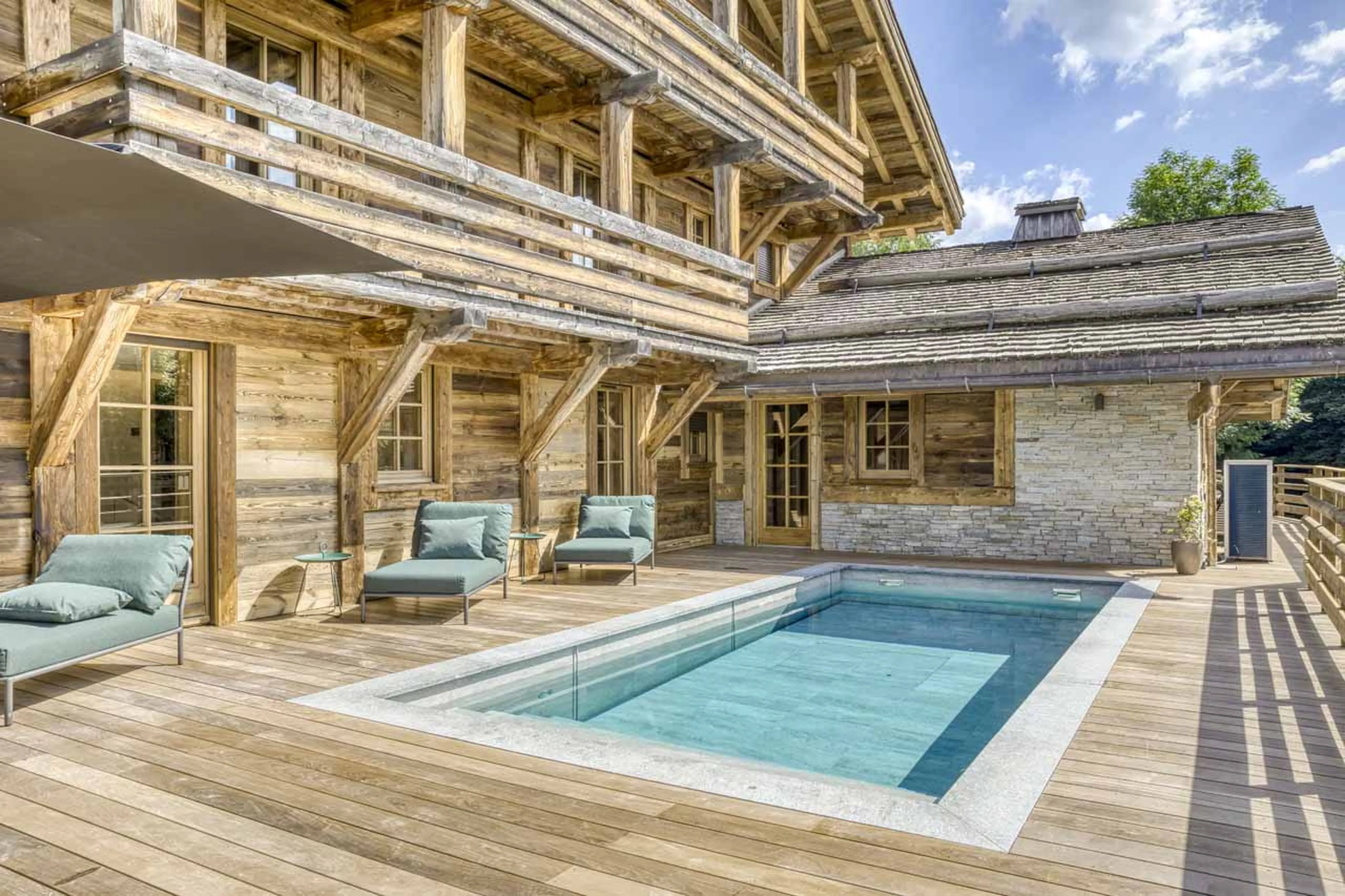Terrace outdoor pool at Chalet Maier in Megeve