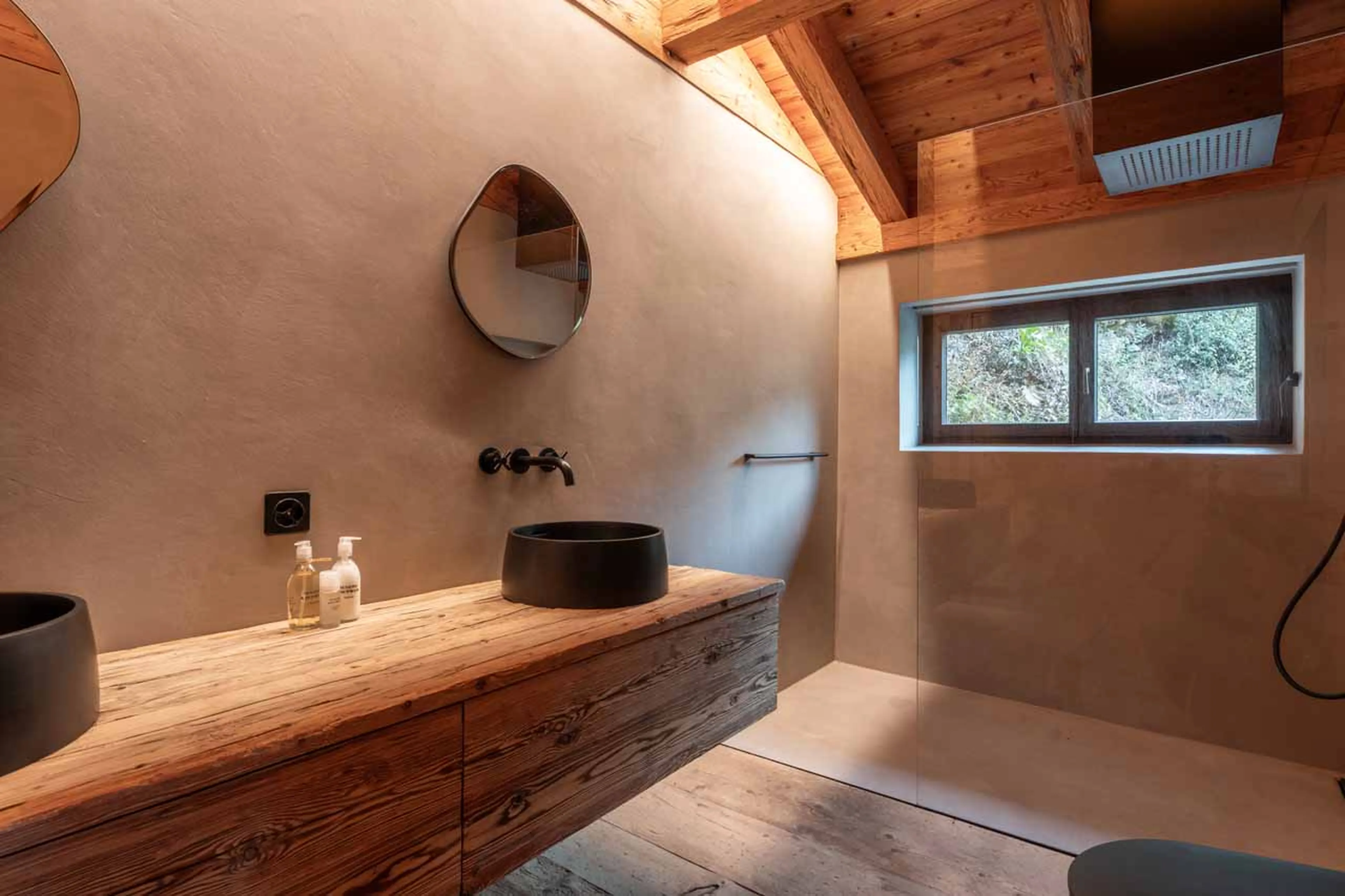 En-suite shower room at Chalet Mannenberg near Gstaad