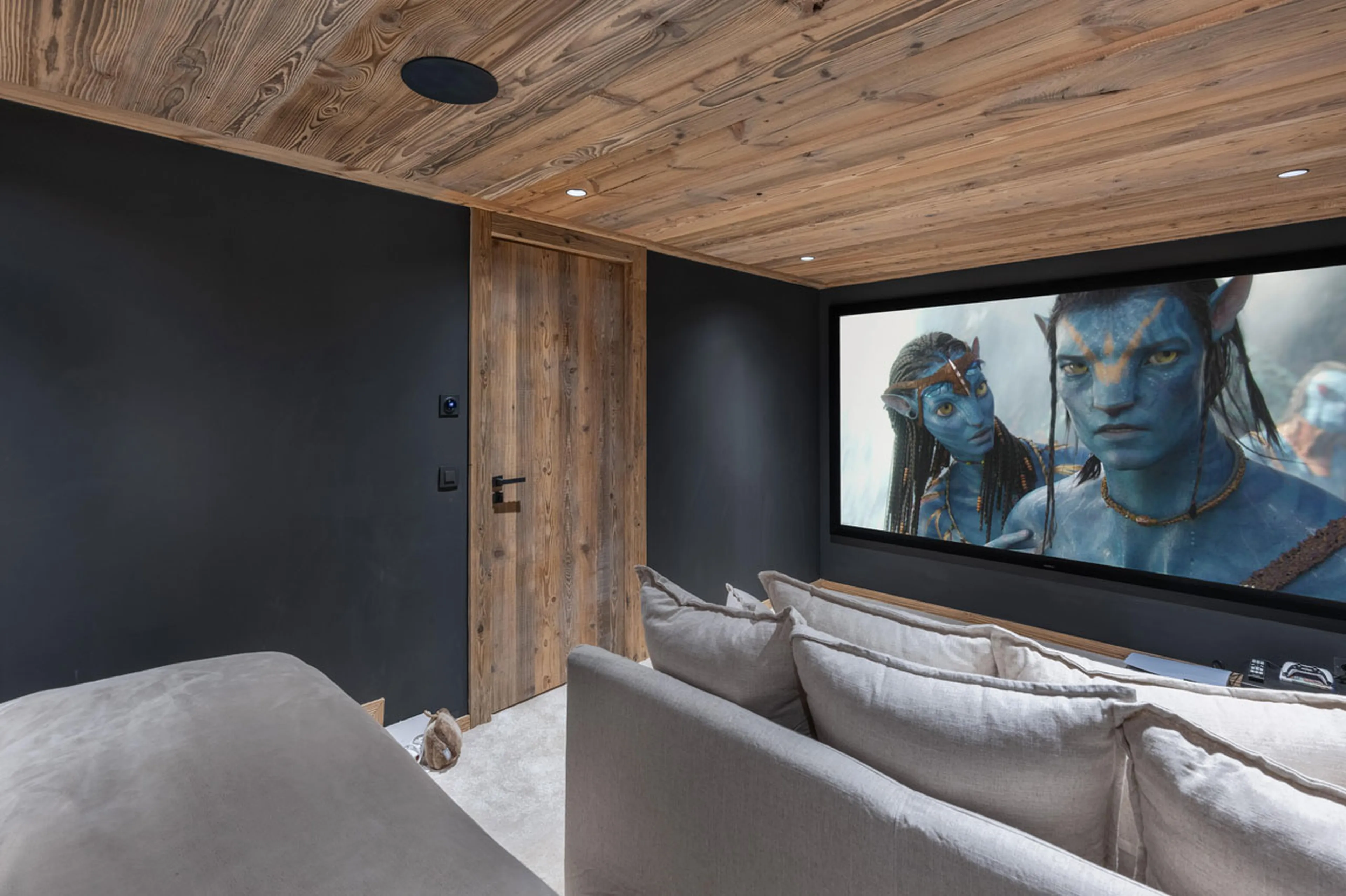 Cinema room with comfortable seating in Chalet Marcel, St Martin de Belleville