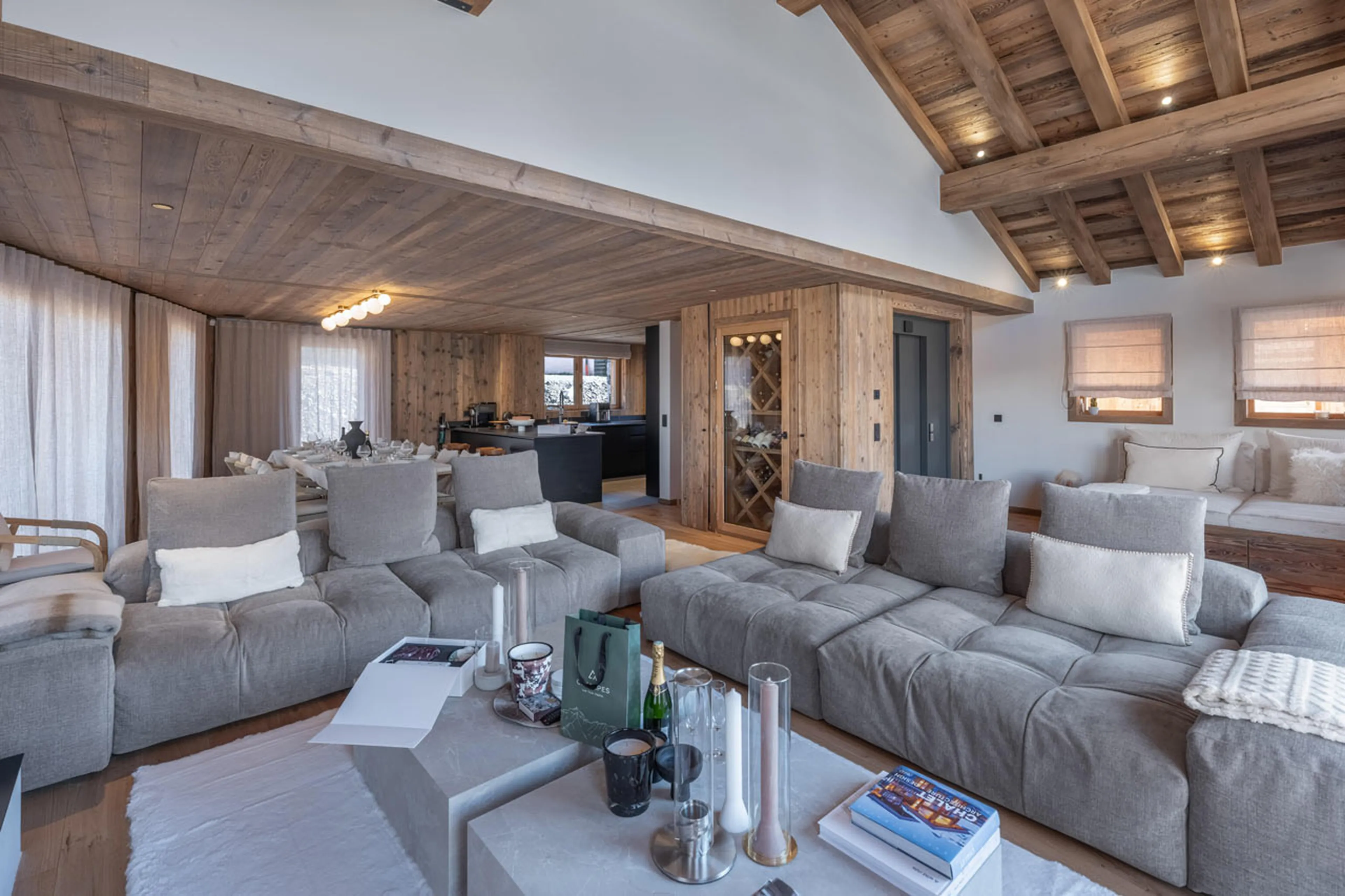 Open-plan sitting and dining area in Chalet Marcel, St Martin de Belleville
