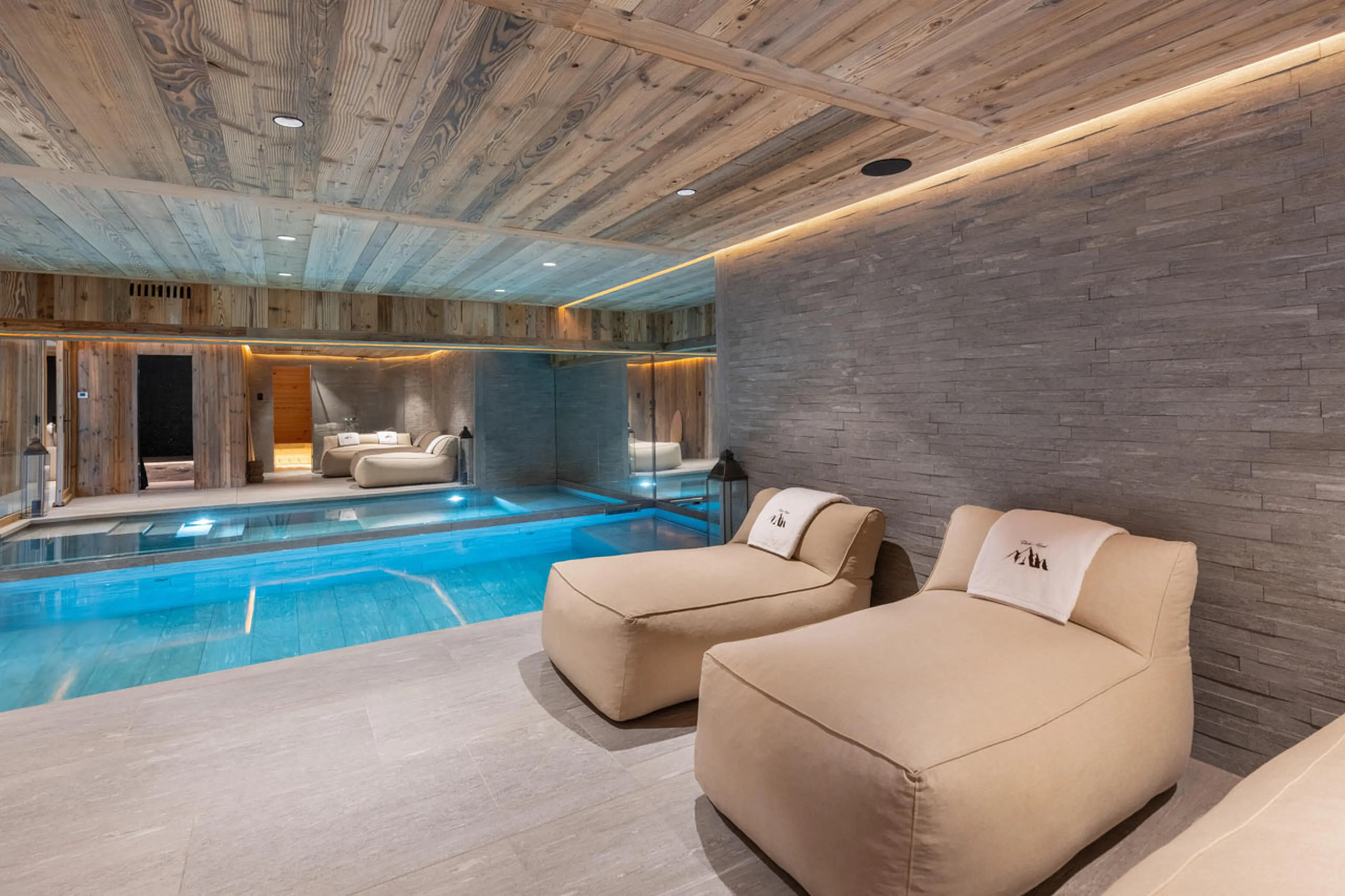 Swimming pool and relaxation area in Chalet Marcel, St Martin de Belleville