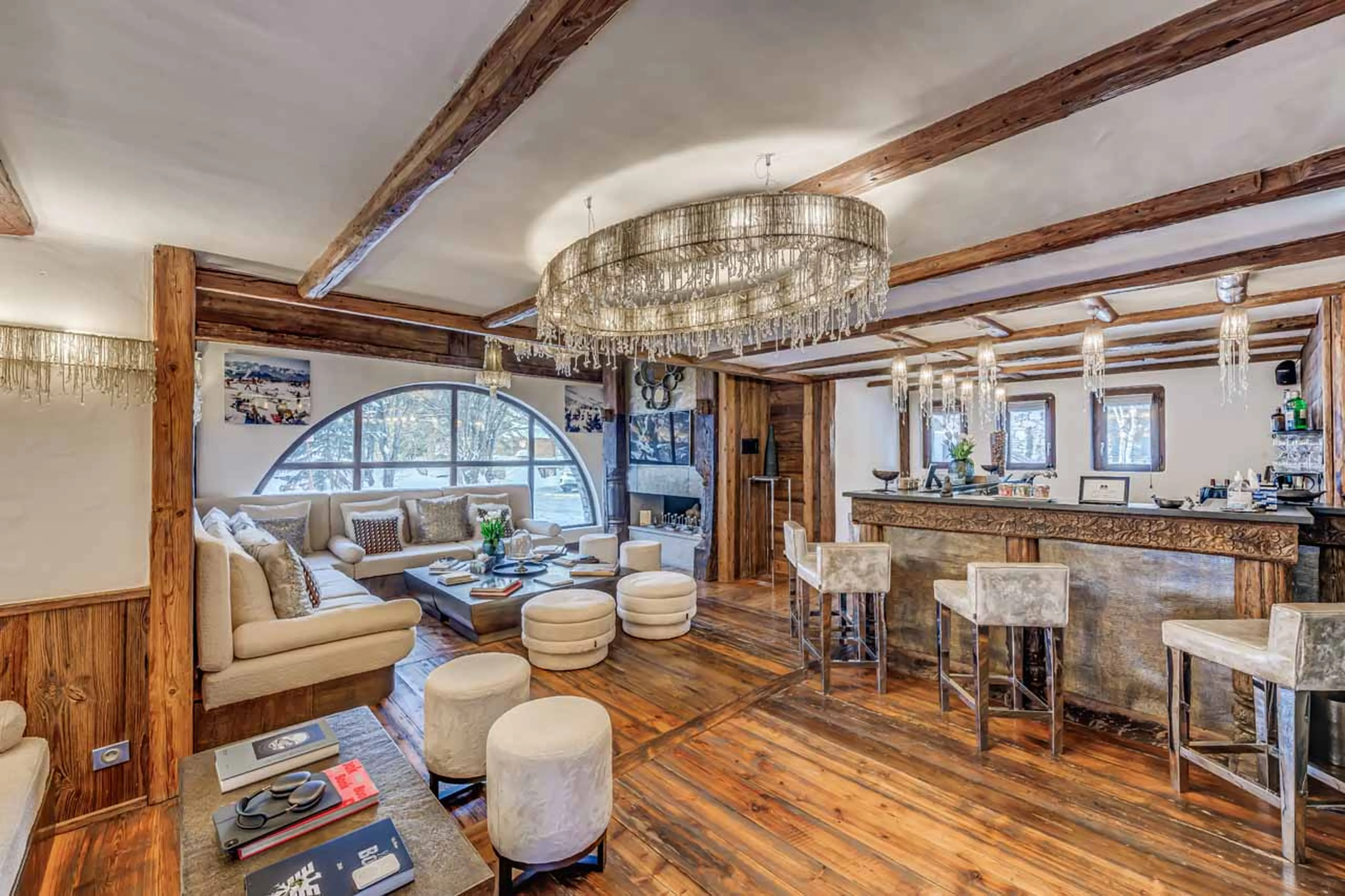 Entertainment lounge, ethanol fireplace, bar and dance floor in Chalet Marco Polo in Val d’ Isere