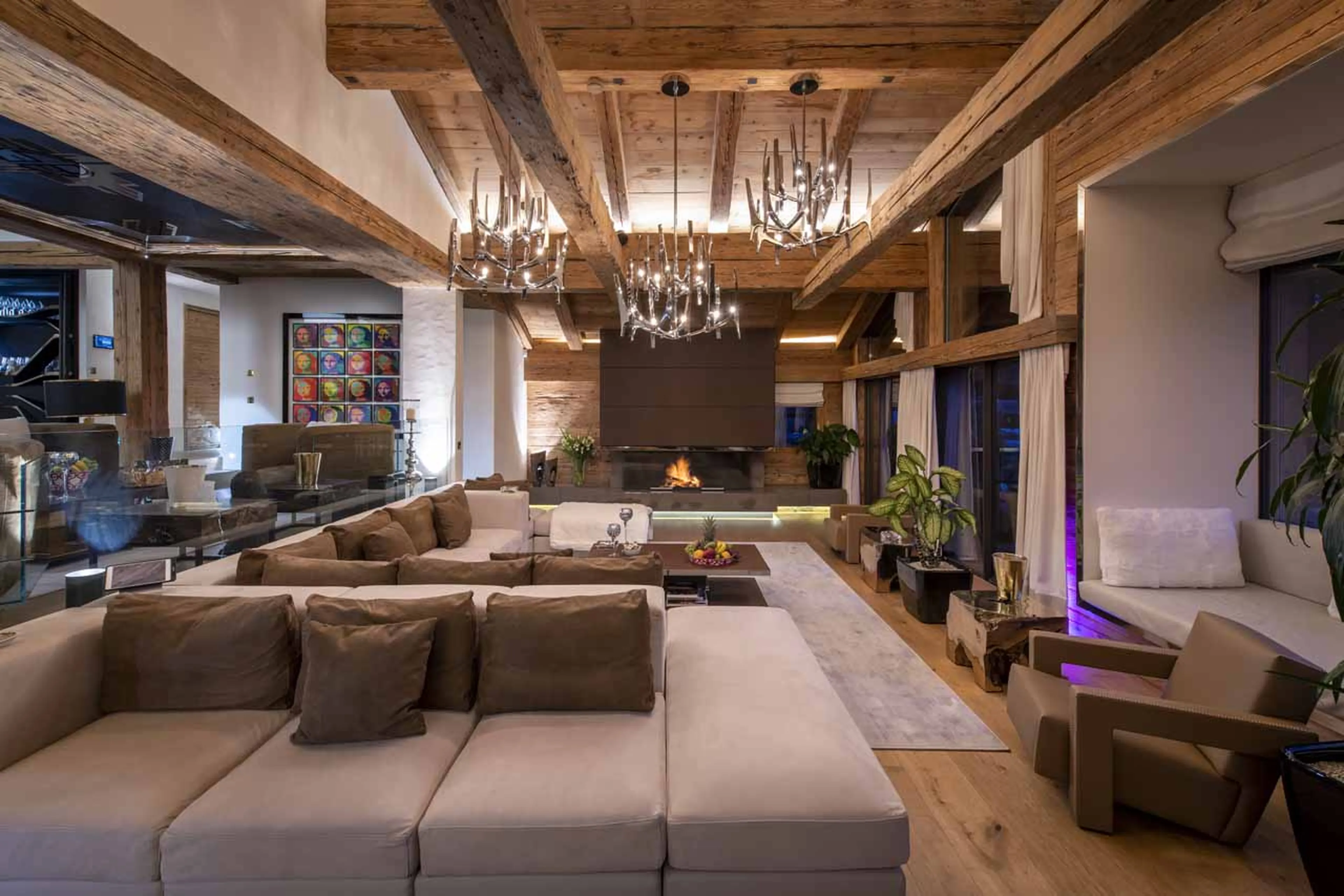 Fireplace in living area of Chalet Marmottier in Verbier