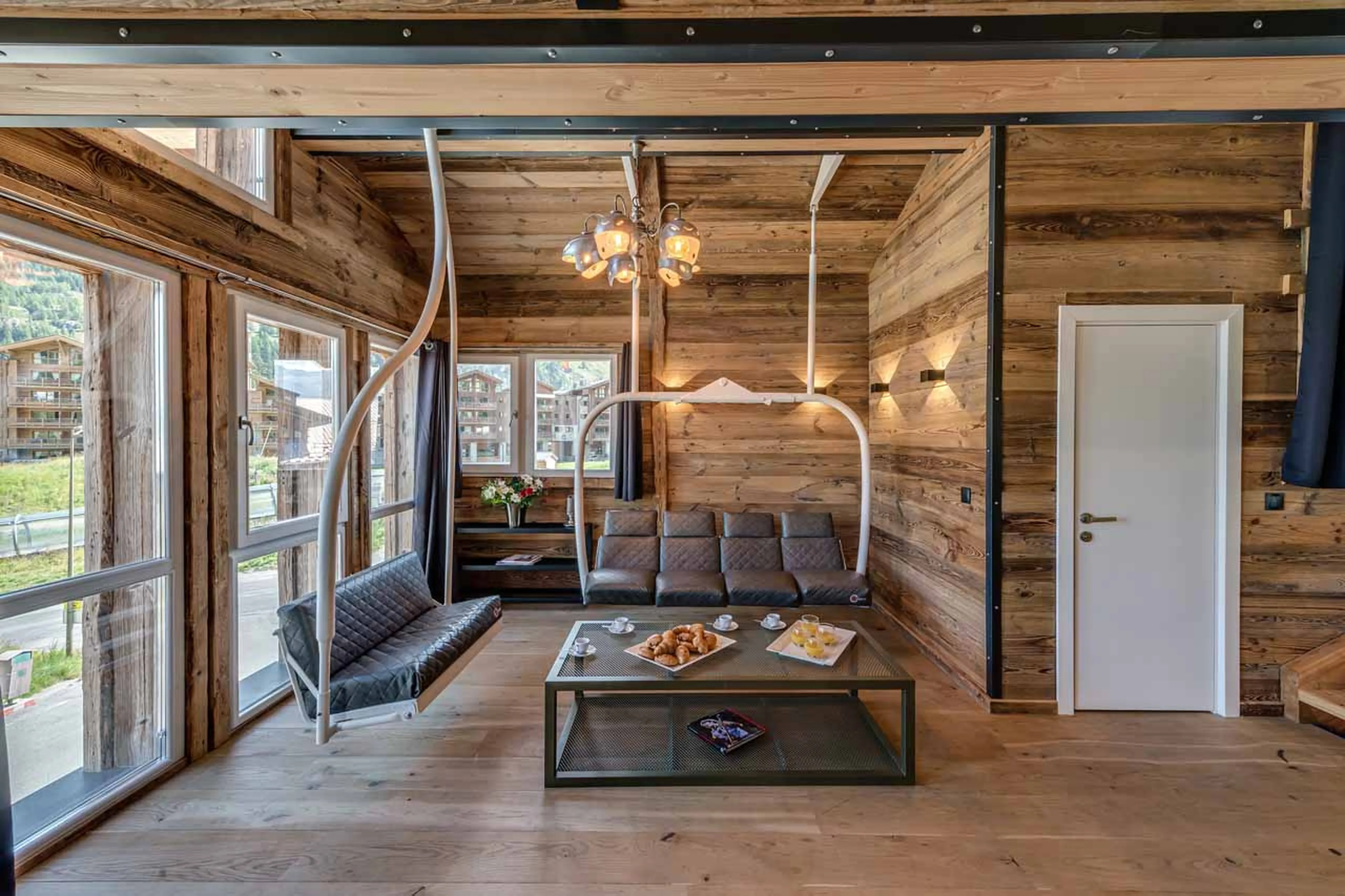 Ski lift style sofa in living area of Chalet Merveilles in Tignes