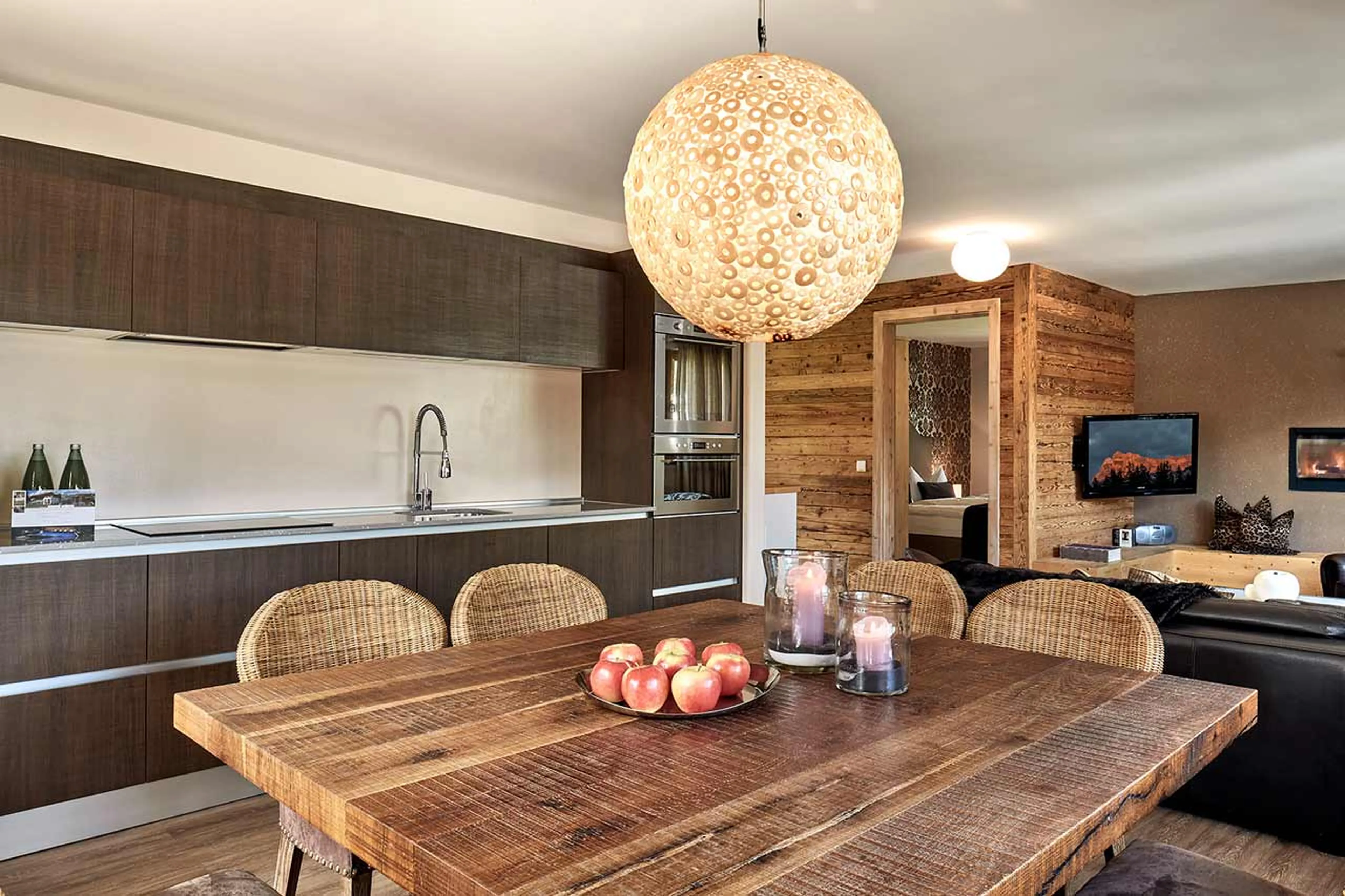 Dining area and kitchen at Chalet Mi Amur in Alta Badia