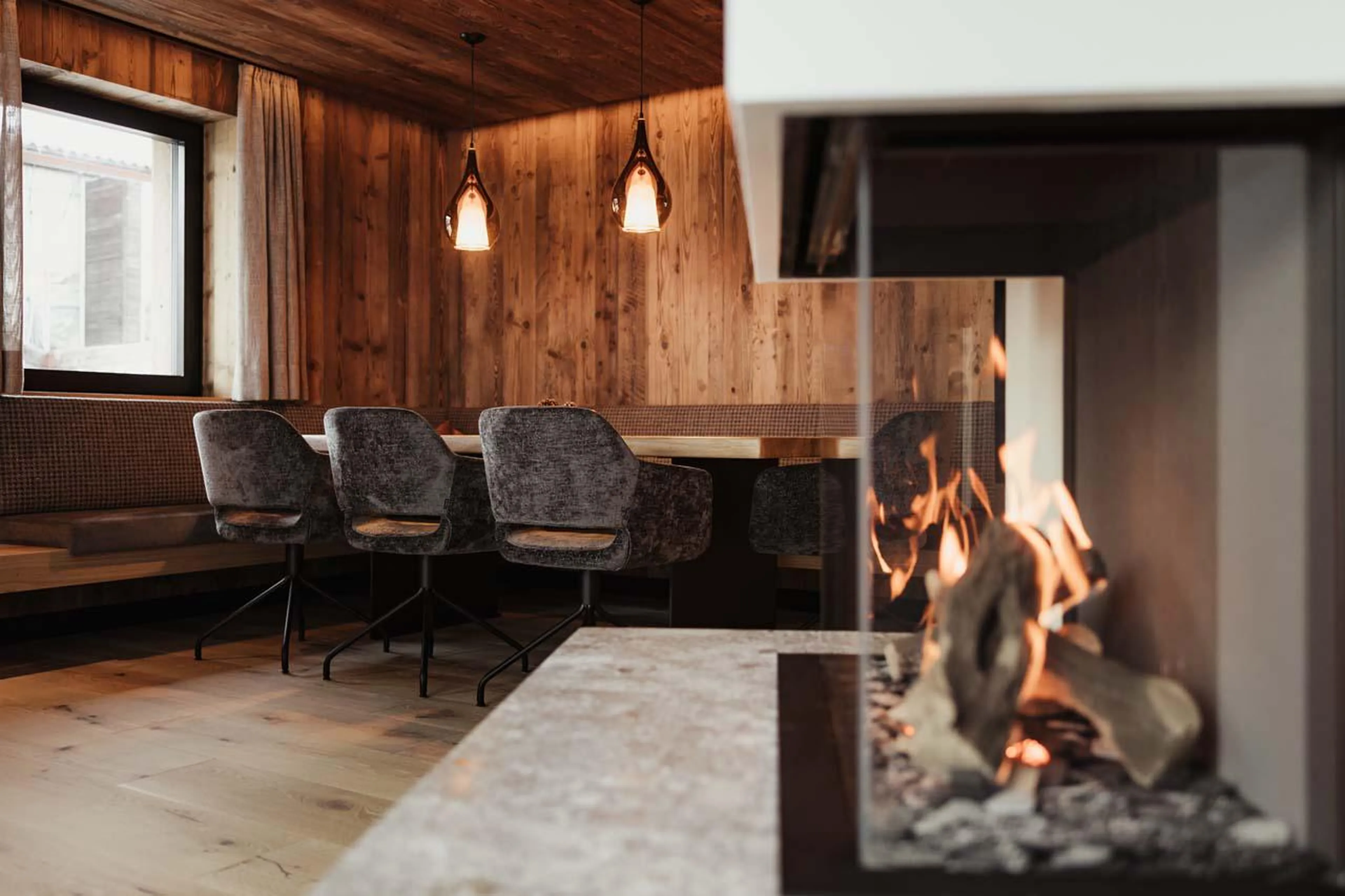 Elegant wooden dining table at Chalet Mile 1 in Val Gardena