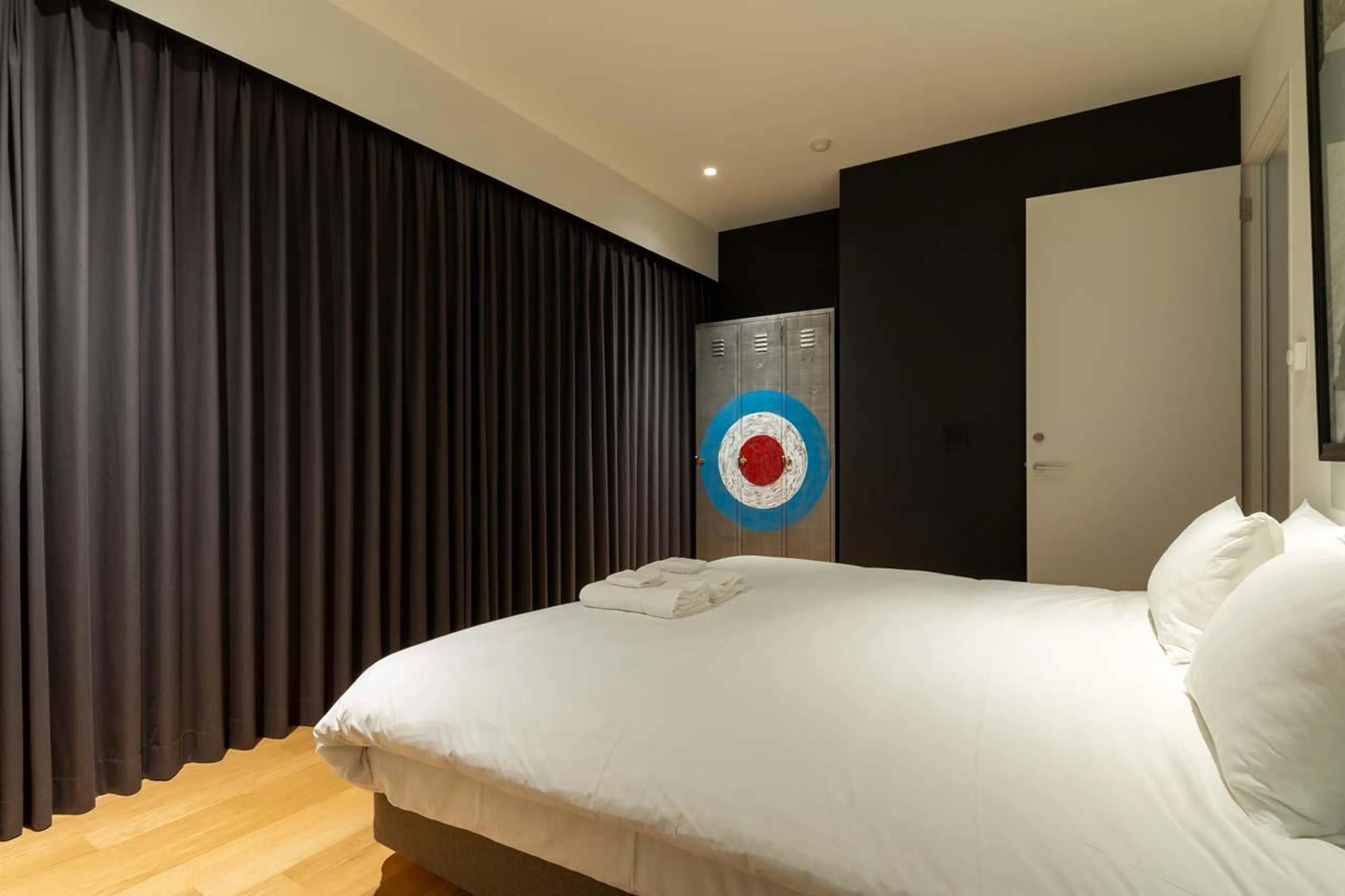 Bedroom with ample storage space at Chalet Millesime in Niseko