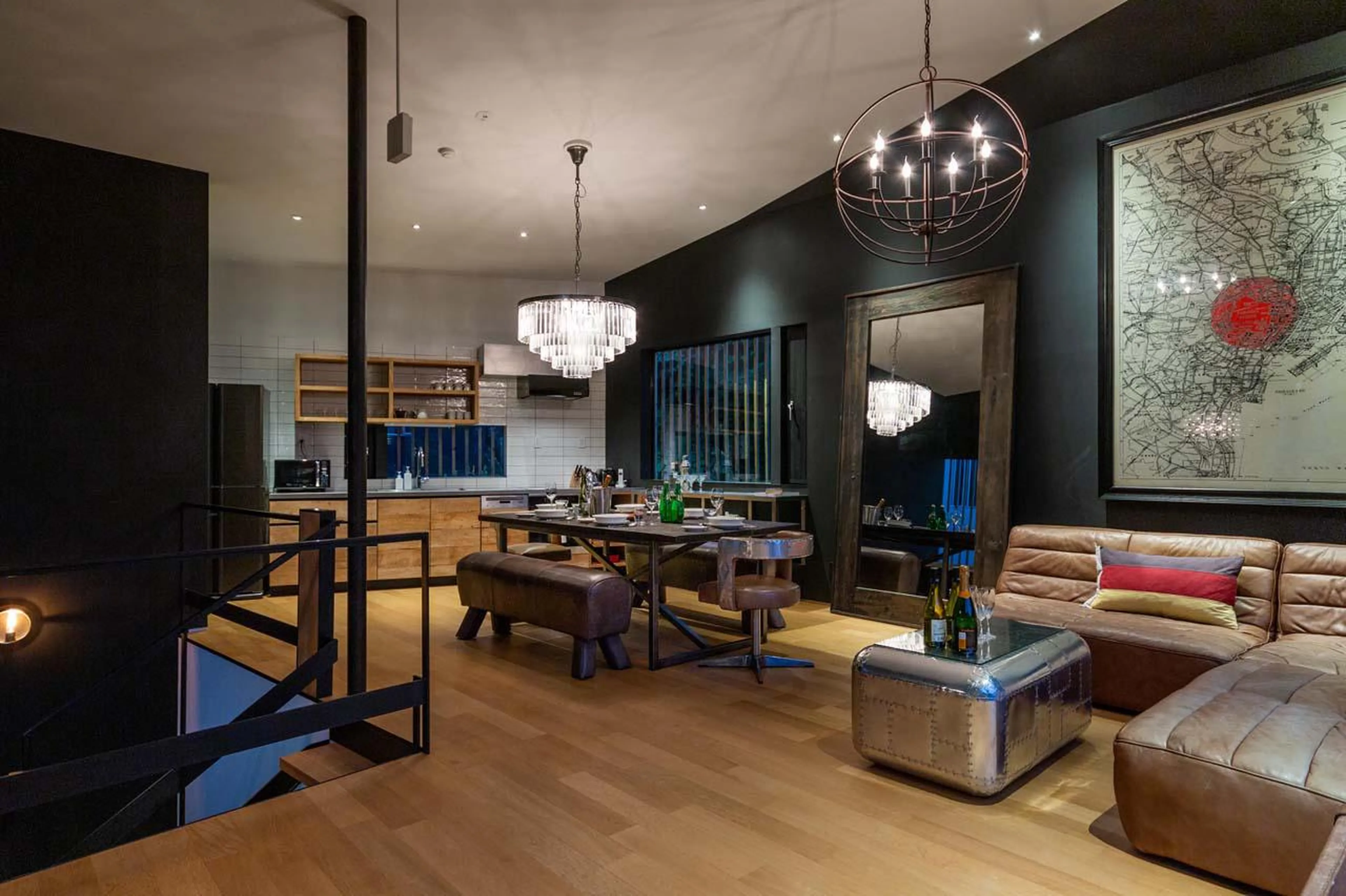 Sociable living area with bold vintage interior at Chalet Millesime in Niseko