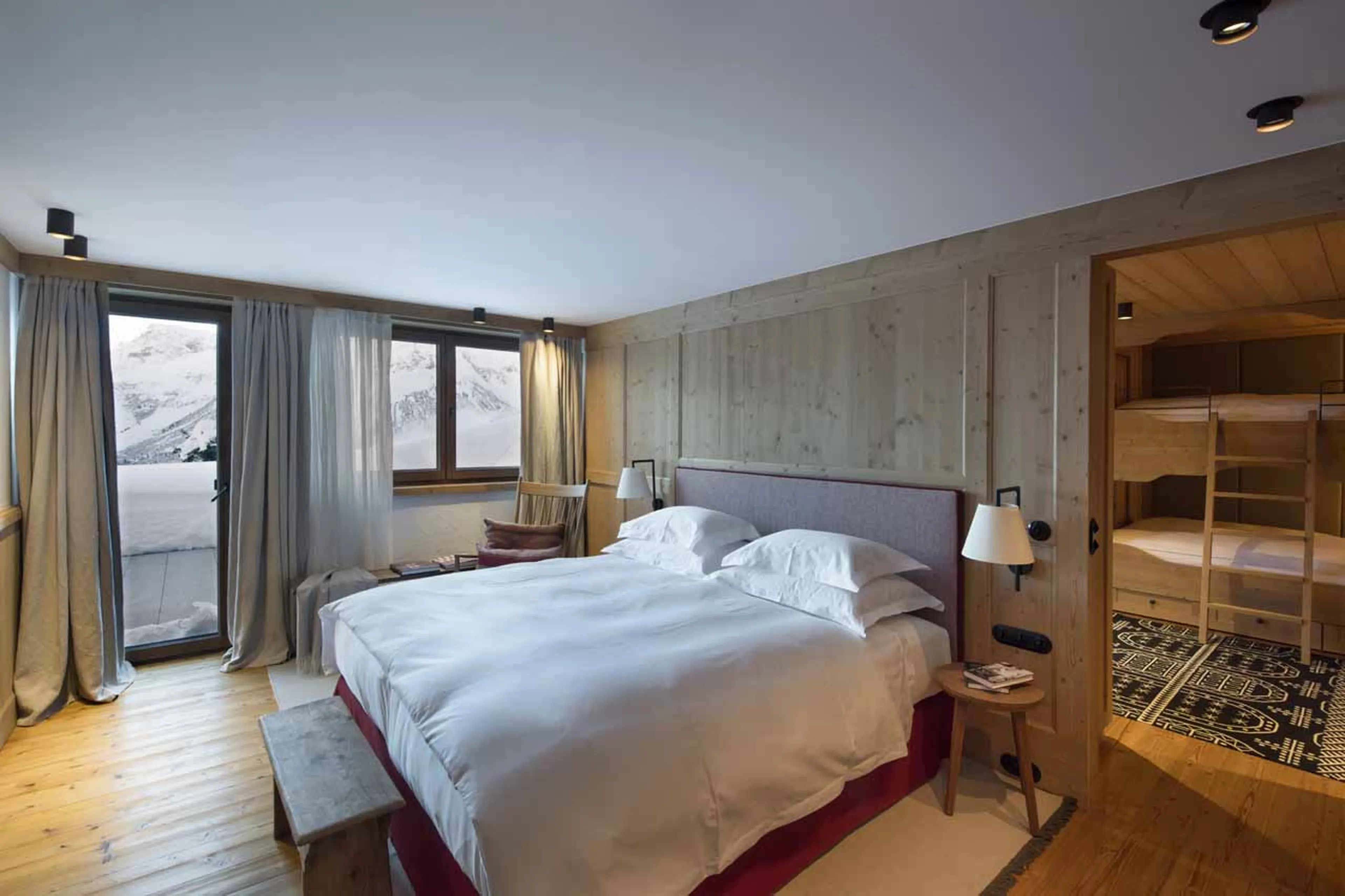 Bedroom four and bunk room at Chalet Mimi in Lech