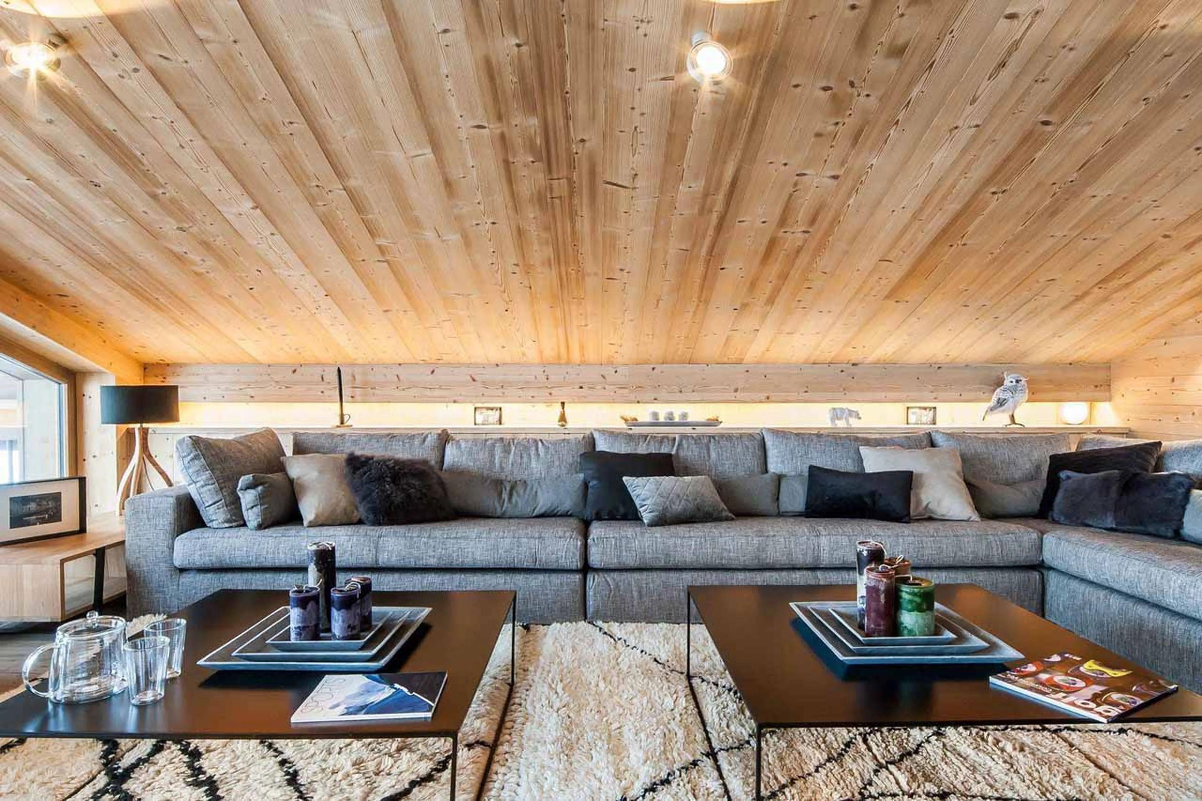 Sofa in living area at Chalet Monch in Courchevel 1550