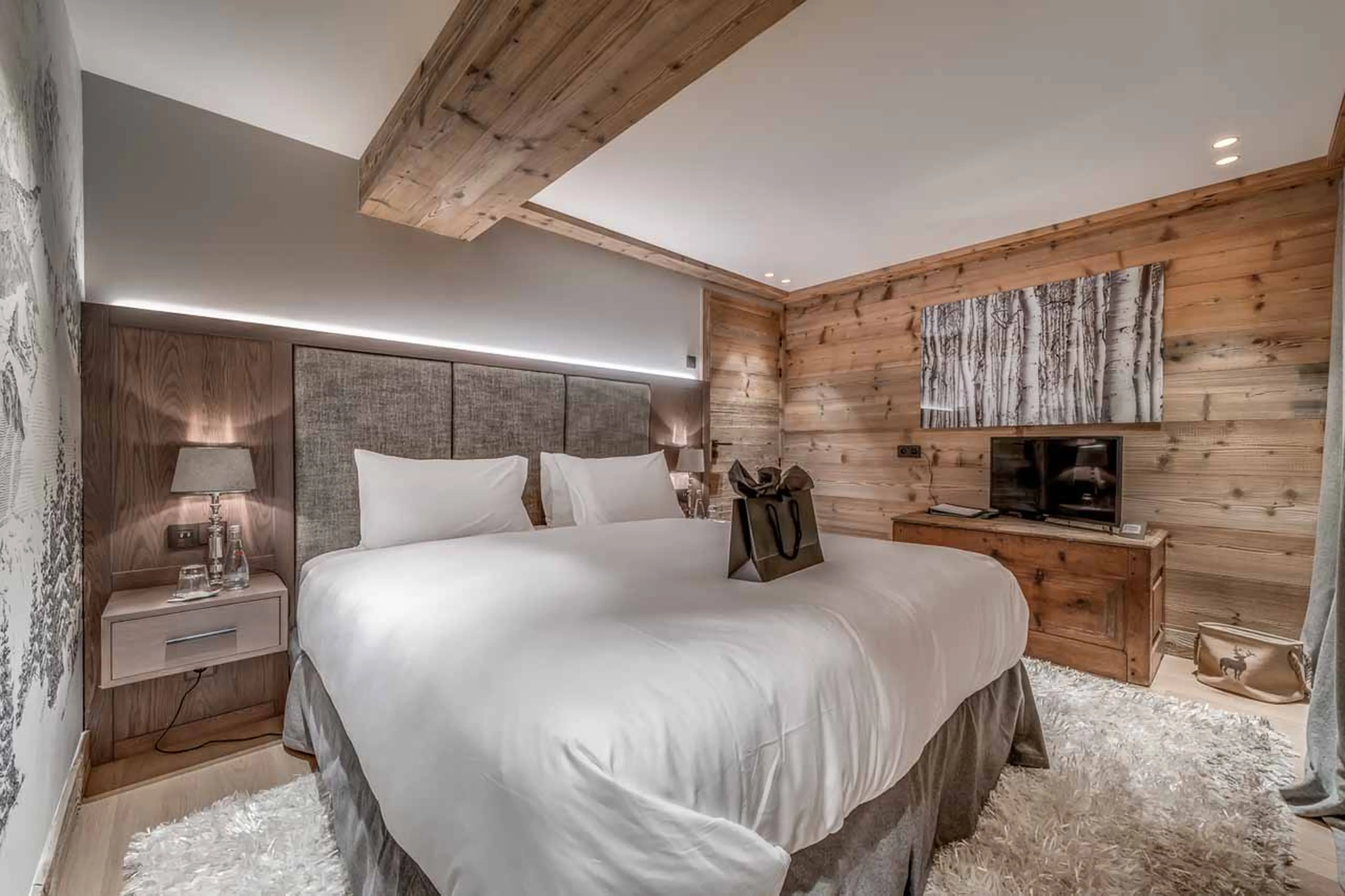TV in bedroom two at  Chalet Le Namaste in Courchevel 1850