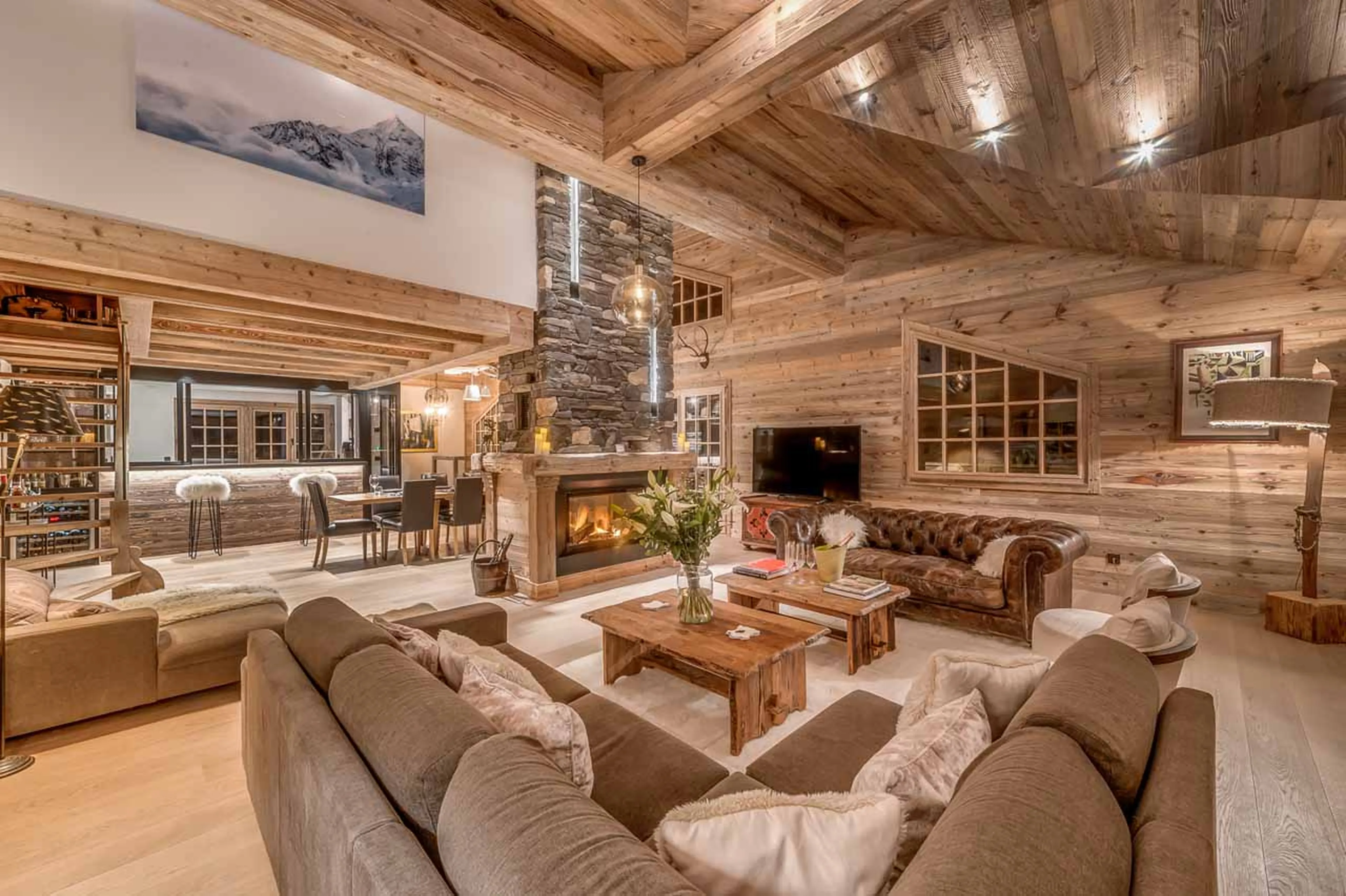 Spacious living and dining area at  Chalet Le Namaste in Courchevel 1850