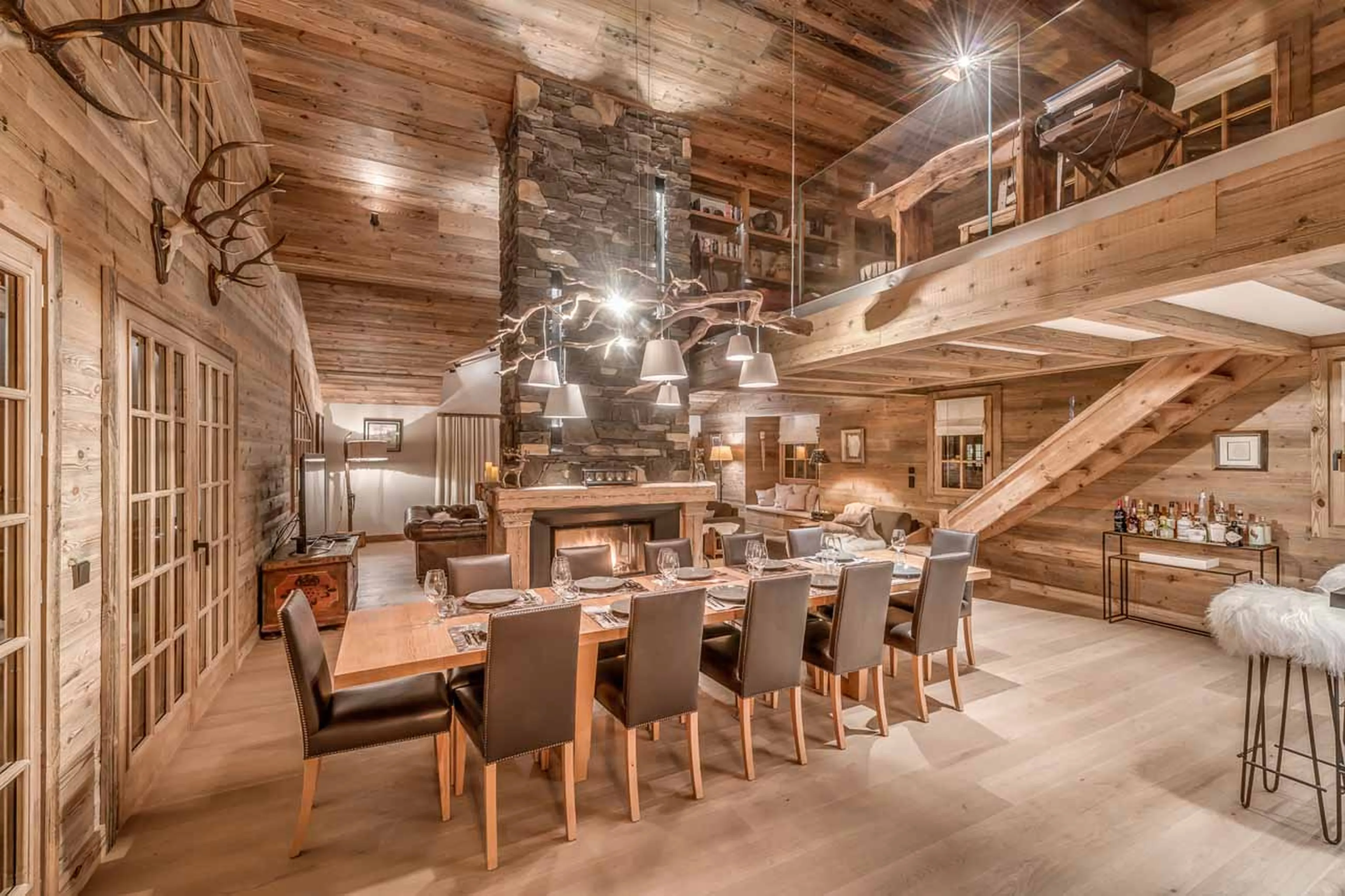 Fireplace in dining area at  Chalet Le Namaste in Courchevel 1850