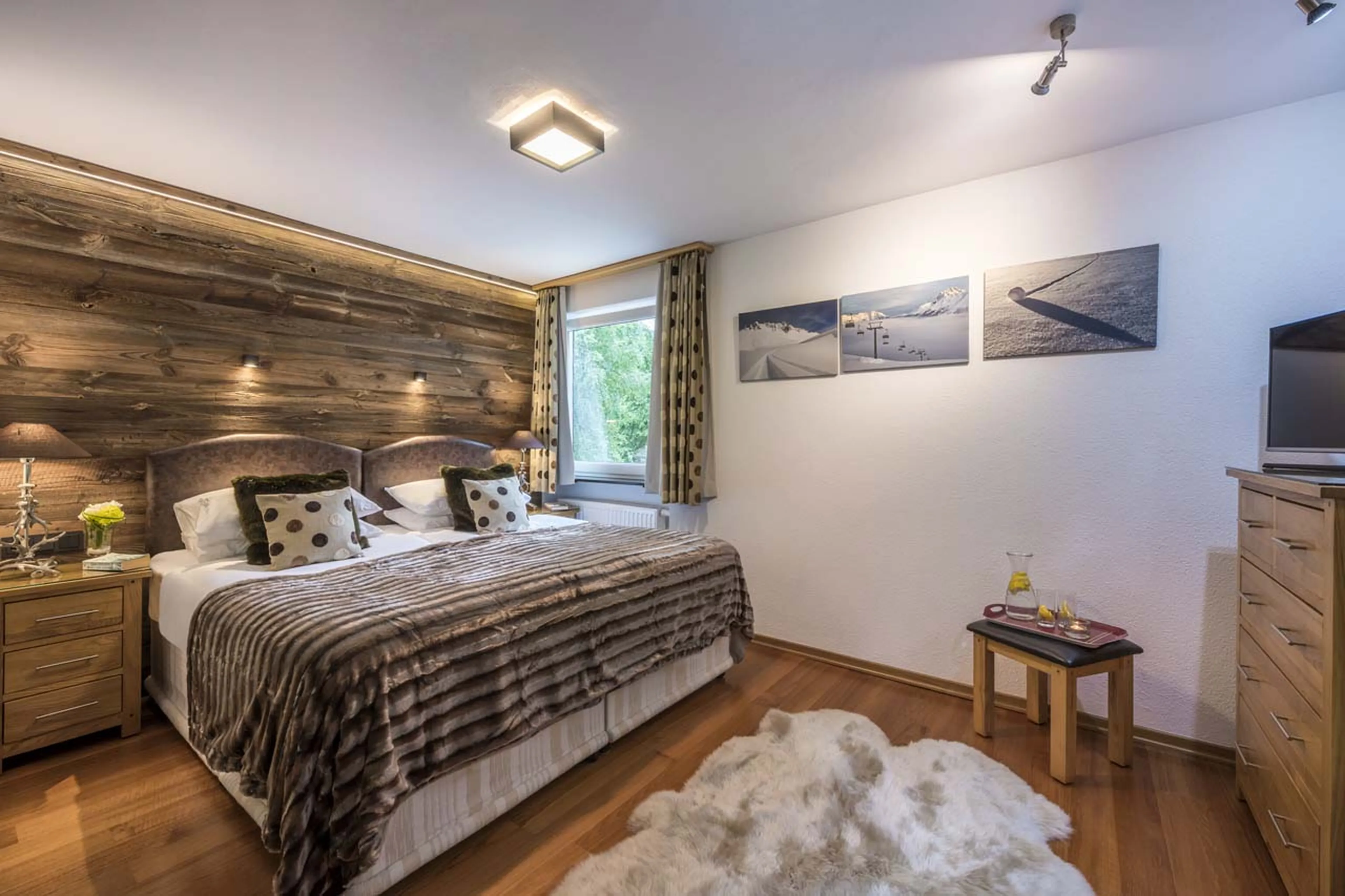 TV in bedroom four at Chalet Narnia in St Anton