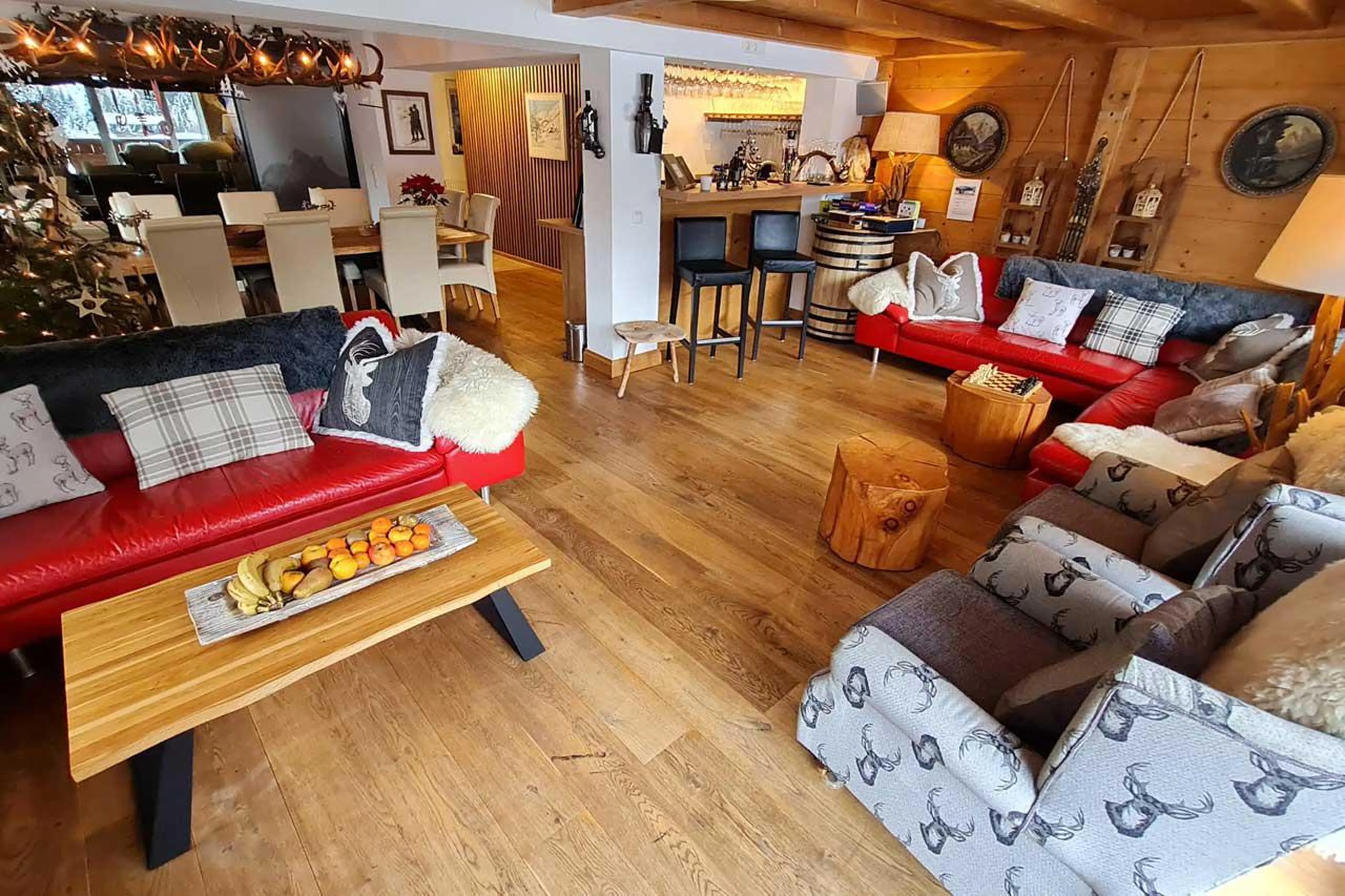 Open-plan living space with traditional chalet feel at Chalet Narnia in St Anton