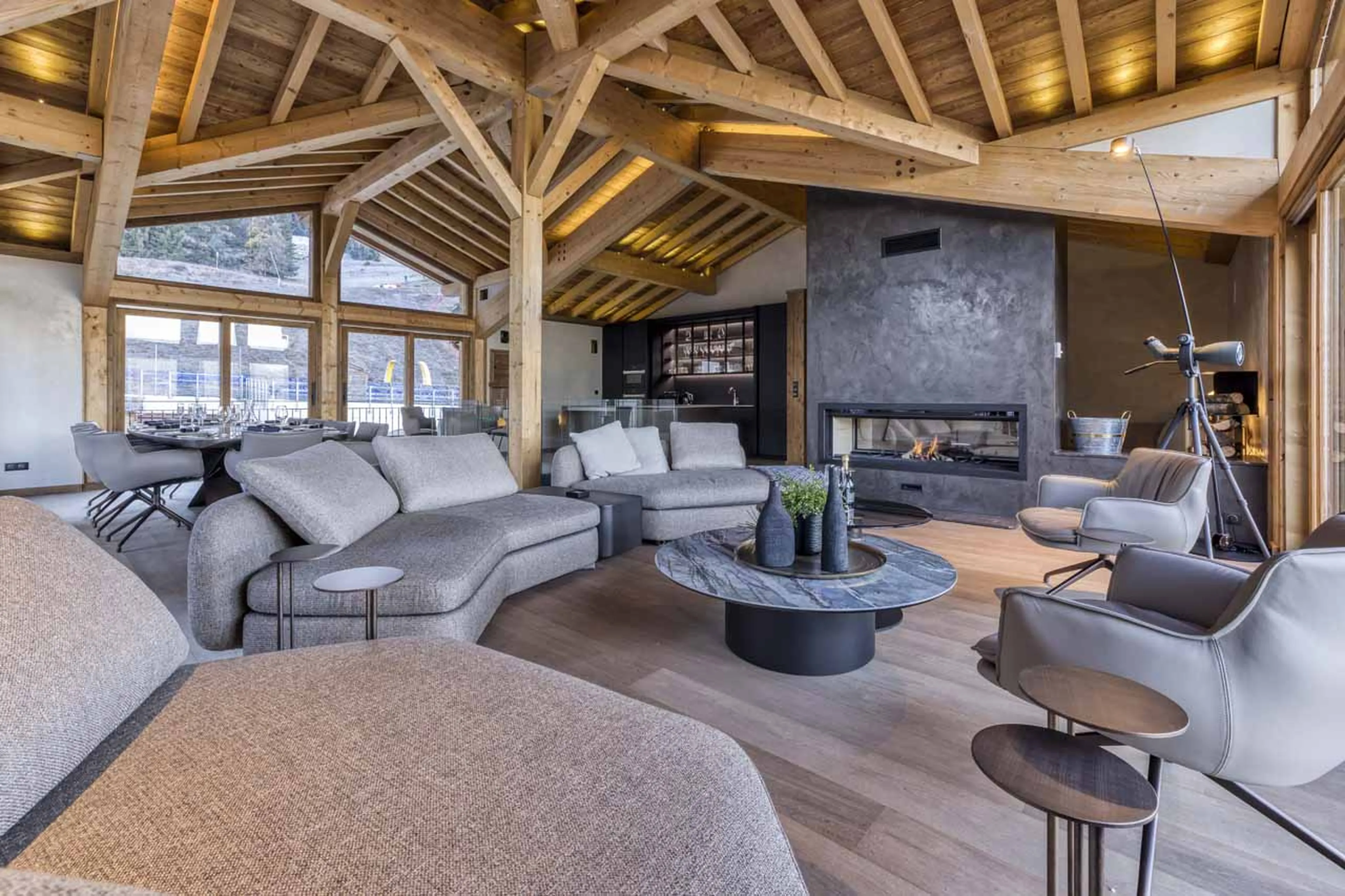 Living area fireplace at Chalet Nid d'Hiver in Courchevel 1550
