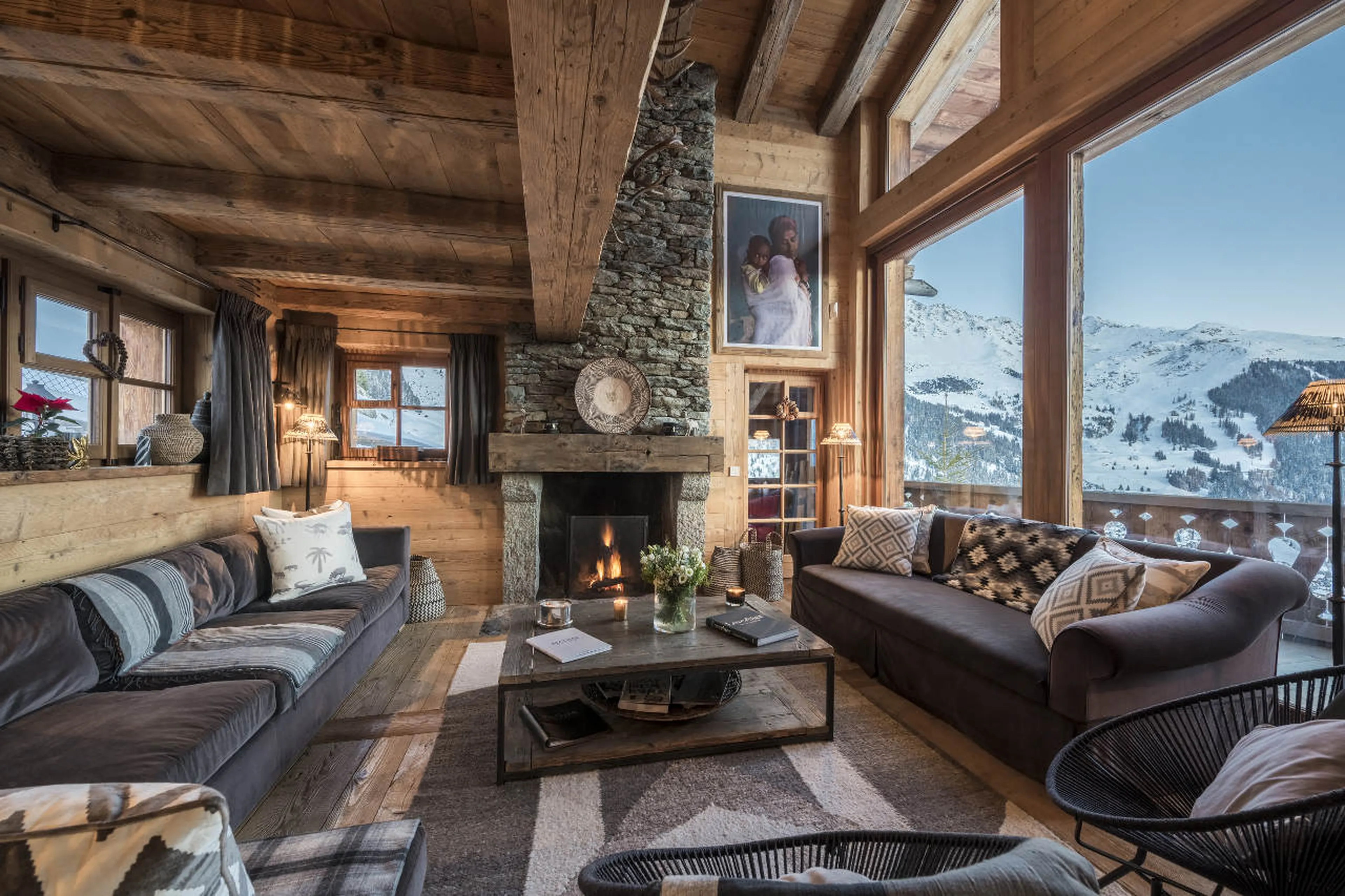 Fireplace in living room of Chalet Nyumba in Verbier