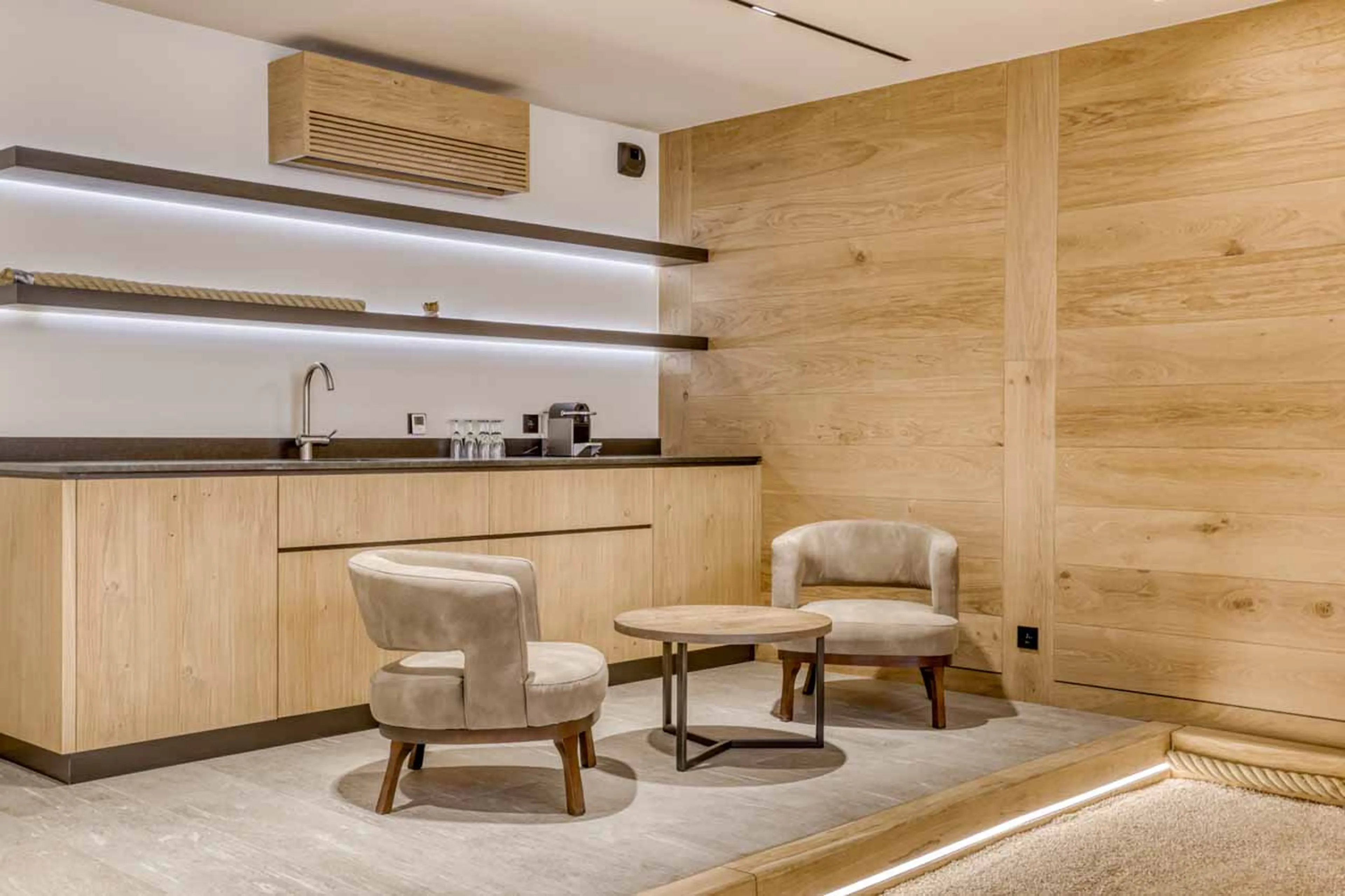 Indoor petanque court relaxation area at Chalet Olivier in Megeve