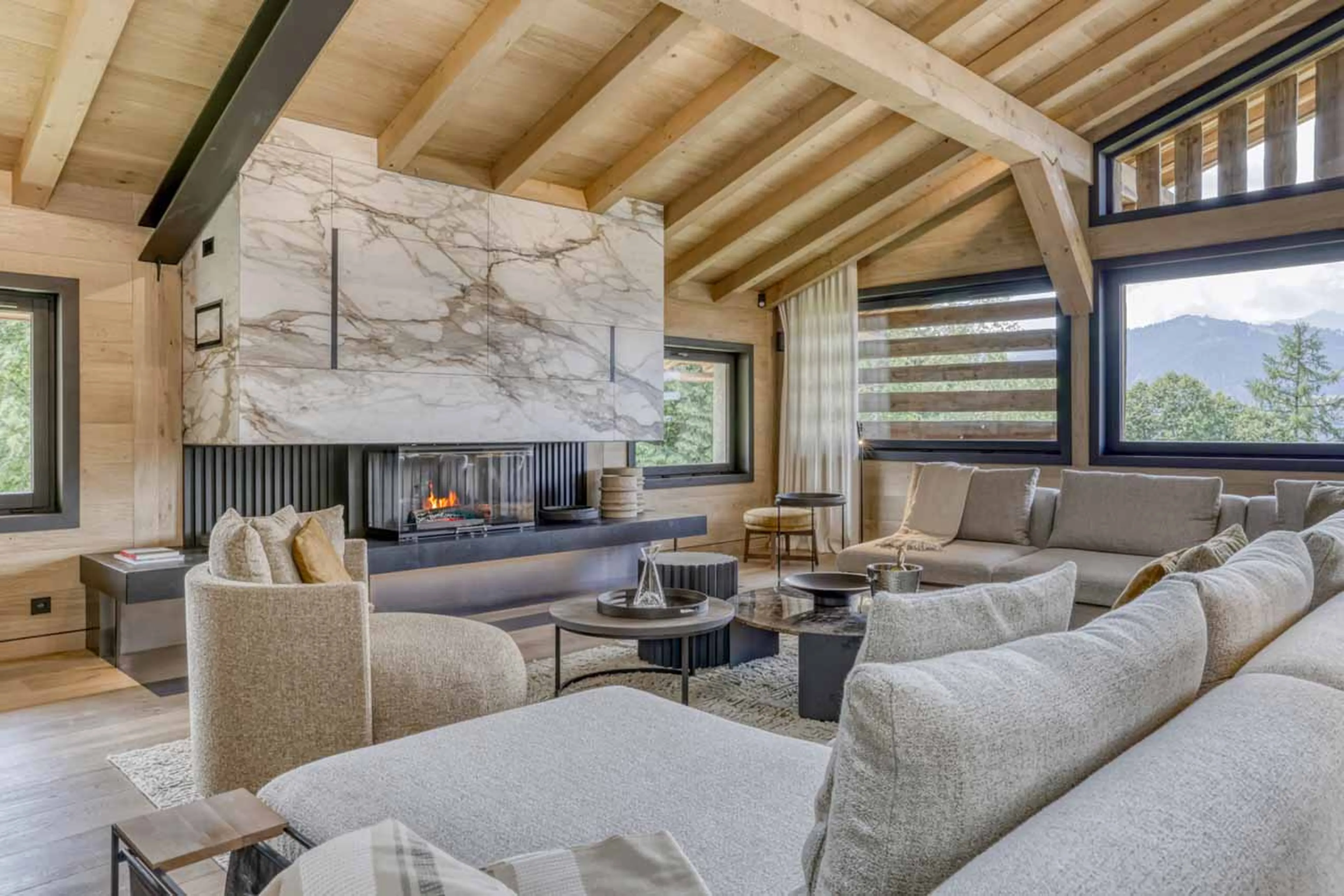 Living room with fireplace at Chalet Olivier in Megeve