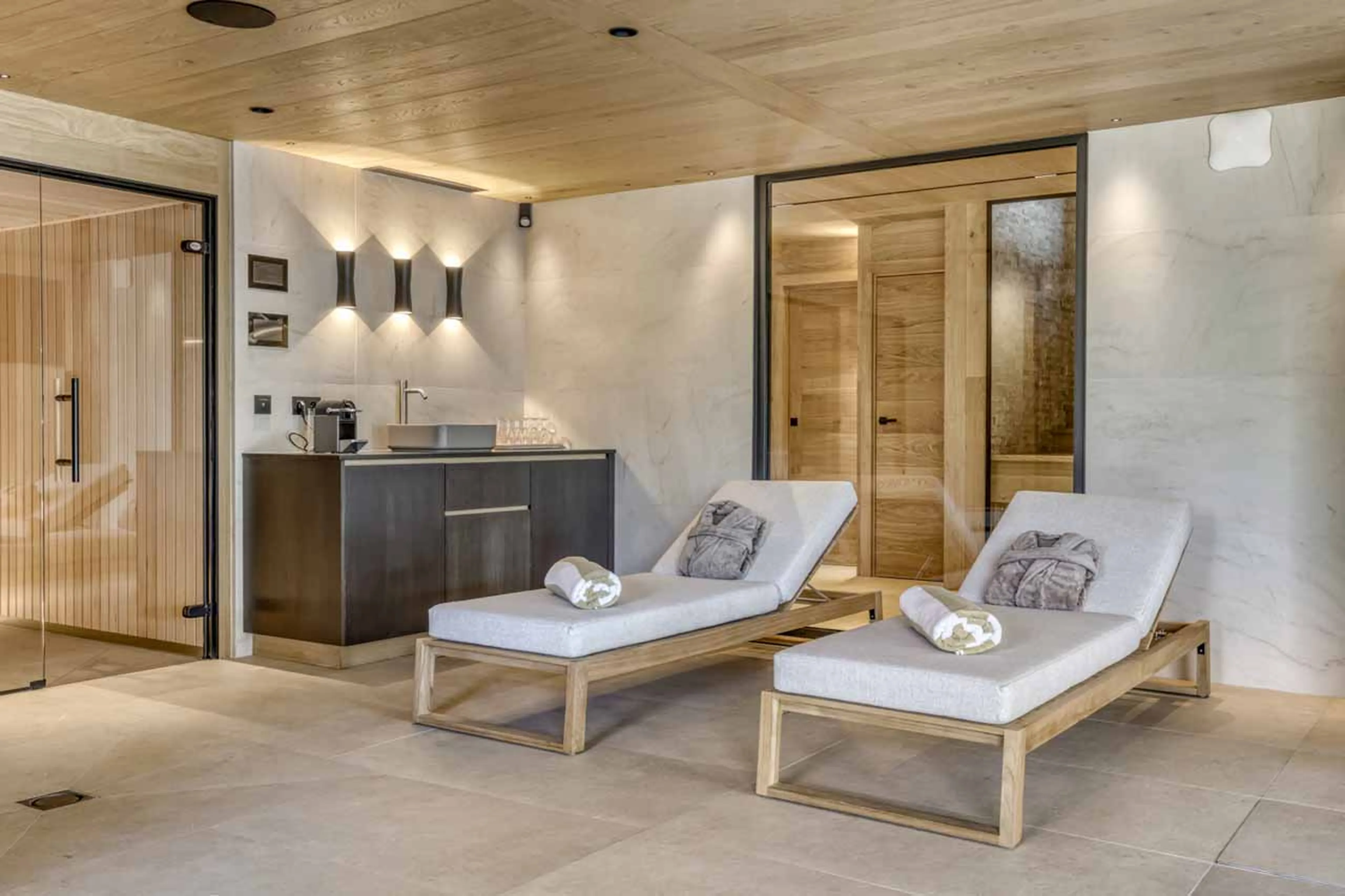 Swimming pool relaxation area at Chalet Olivier in Megeve