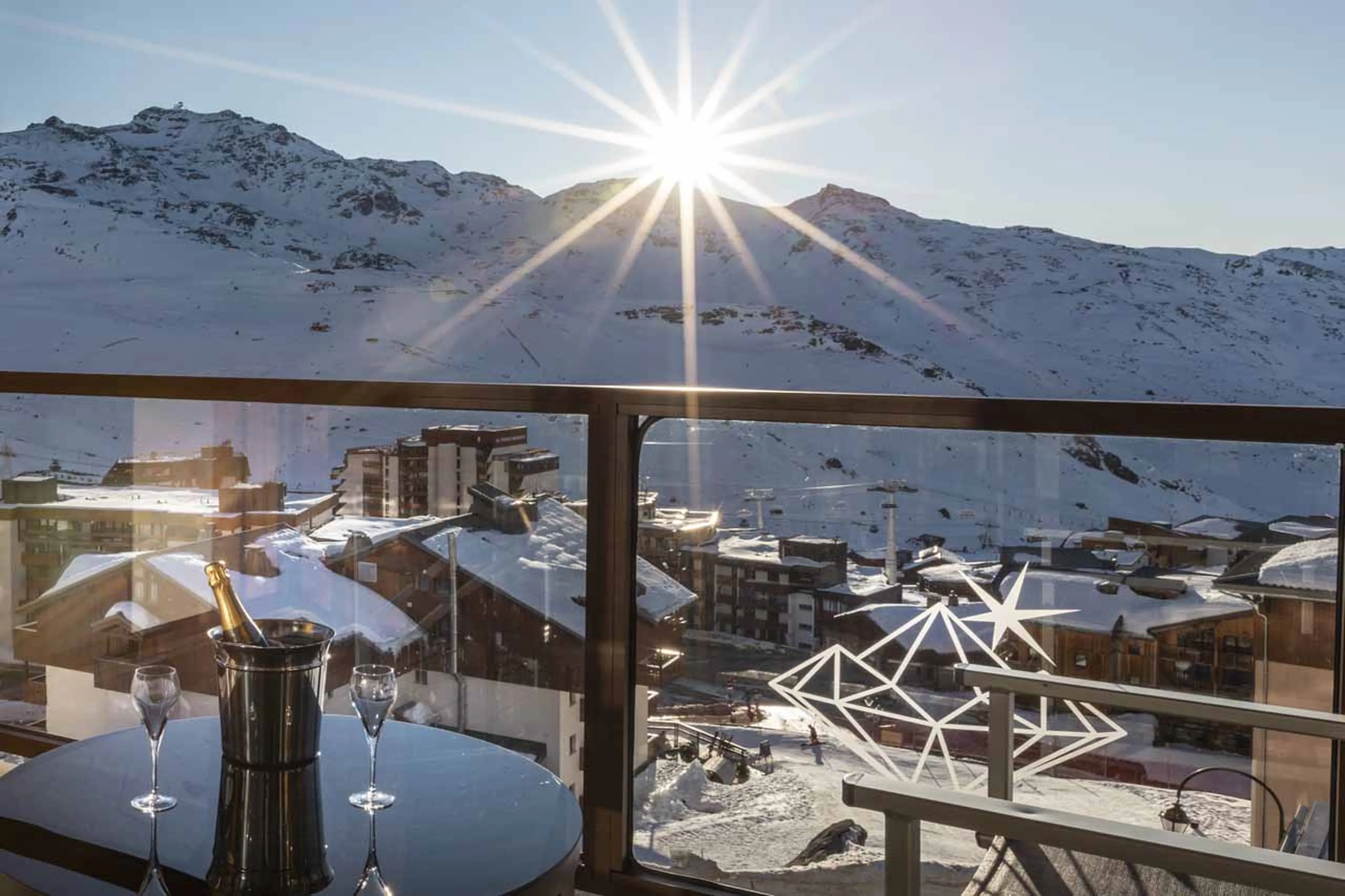 Champagne on the balcony at Chalet Orlov in Val Thorens