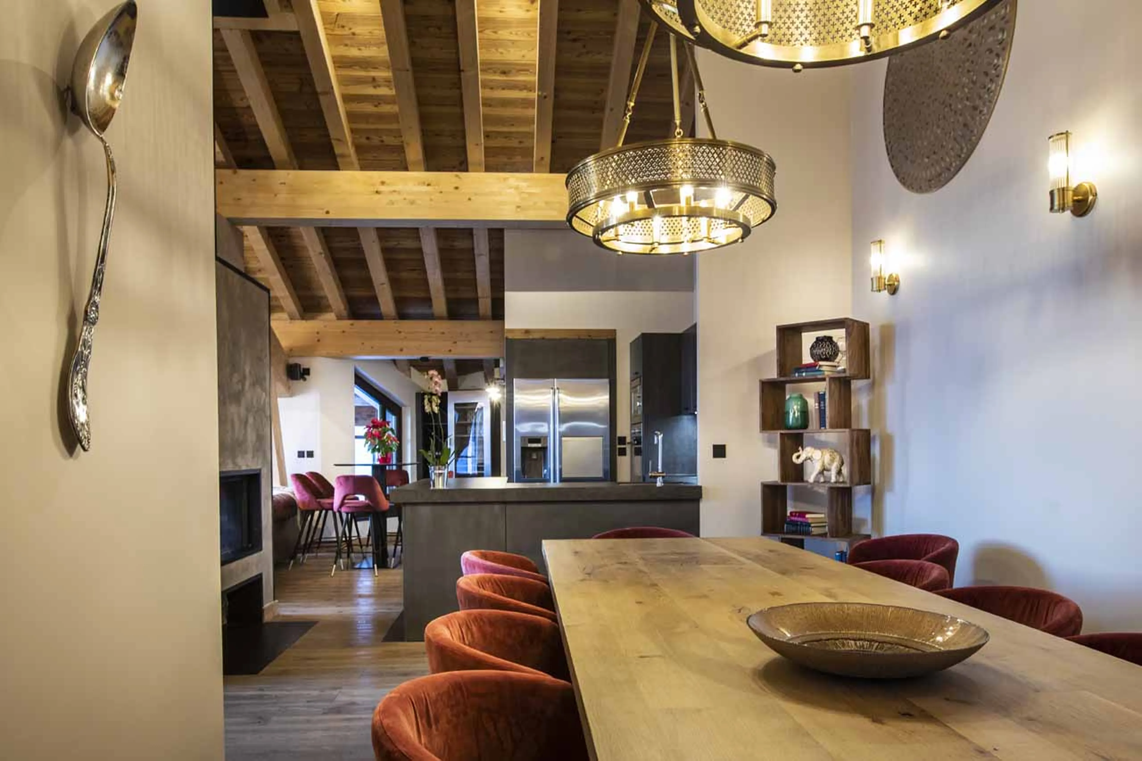 Kitchen and dining area at Chalet Orlov in Val Thorens