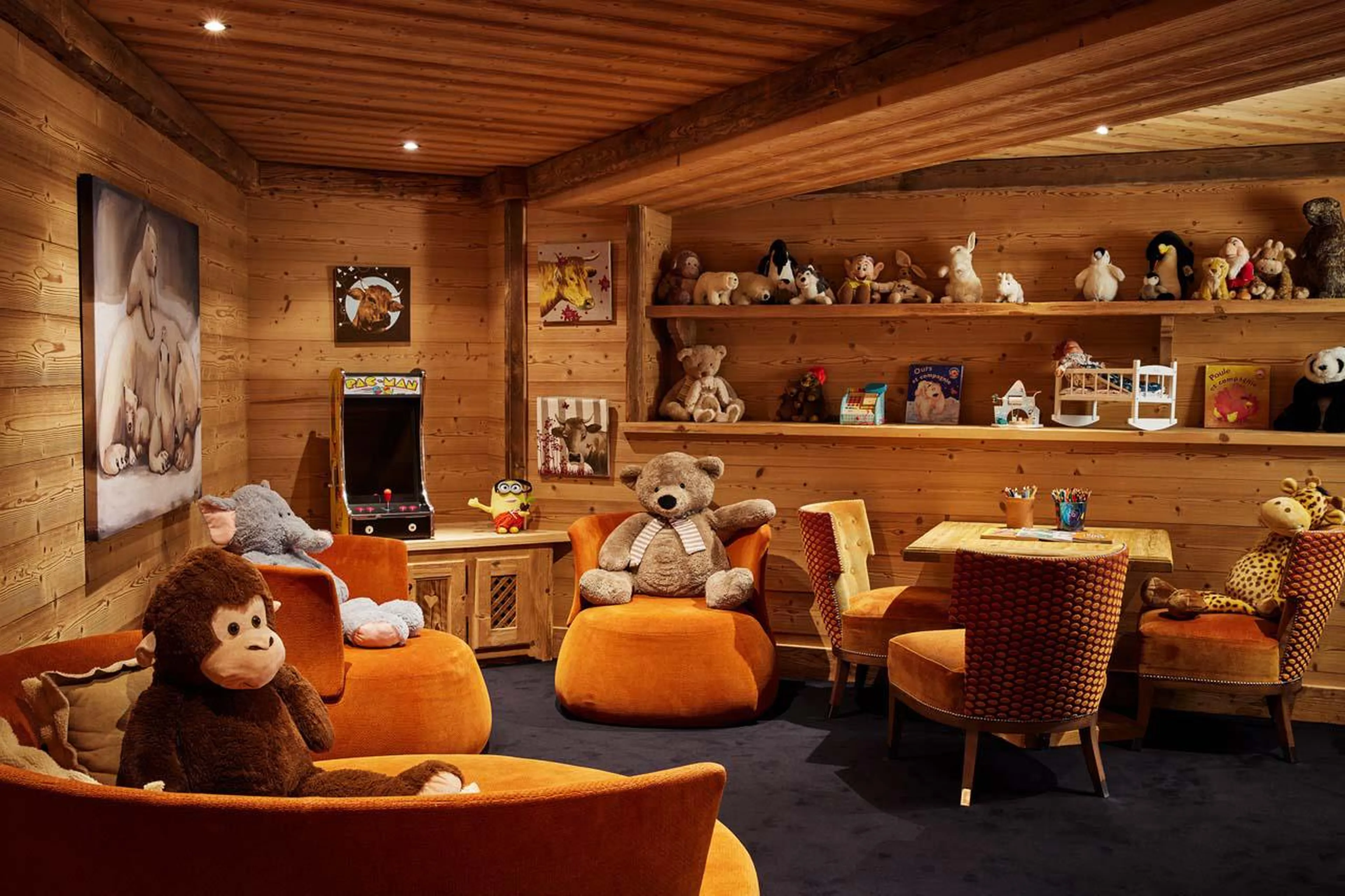 Children’s playroom with toys, books and TV seating in Chalet Ormello in Courchevel 1850