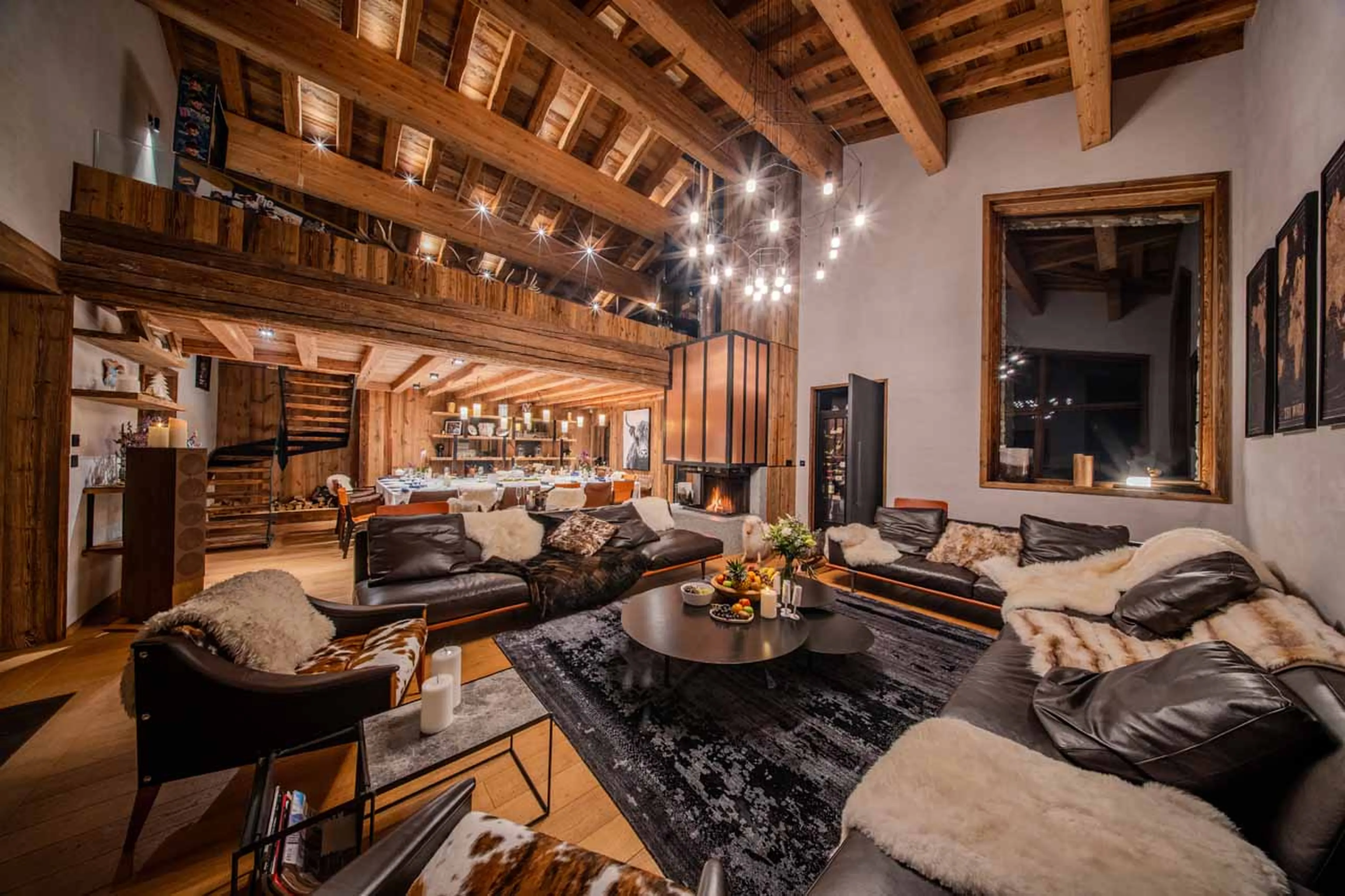 Living area at night at Chalet Orso in Val d'Isere