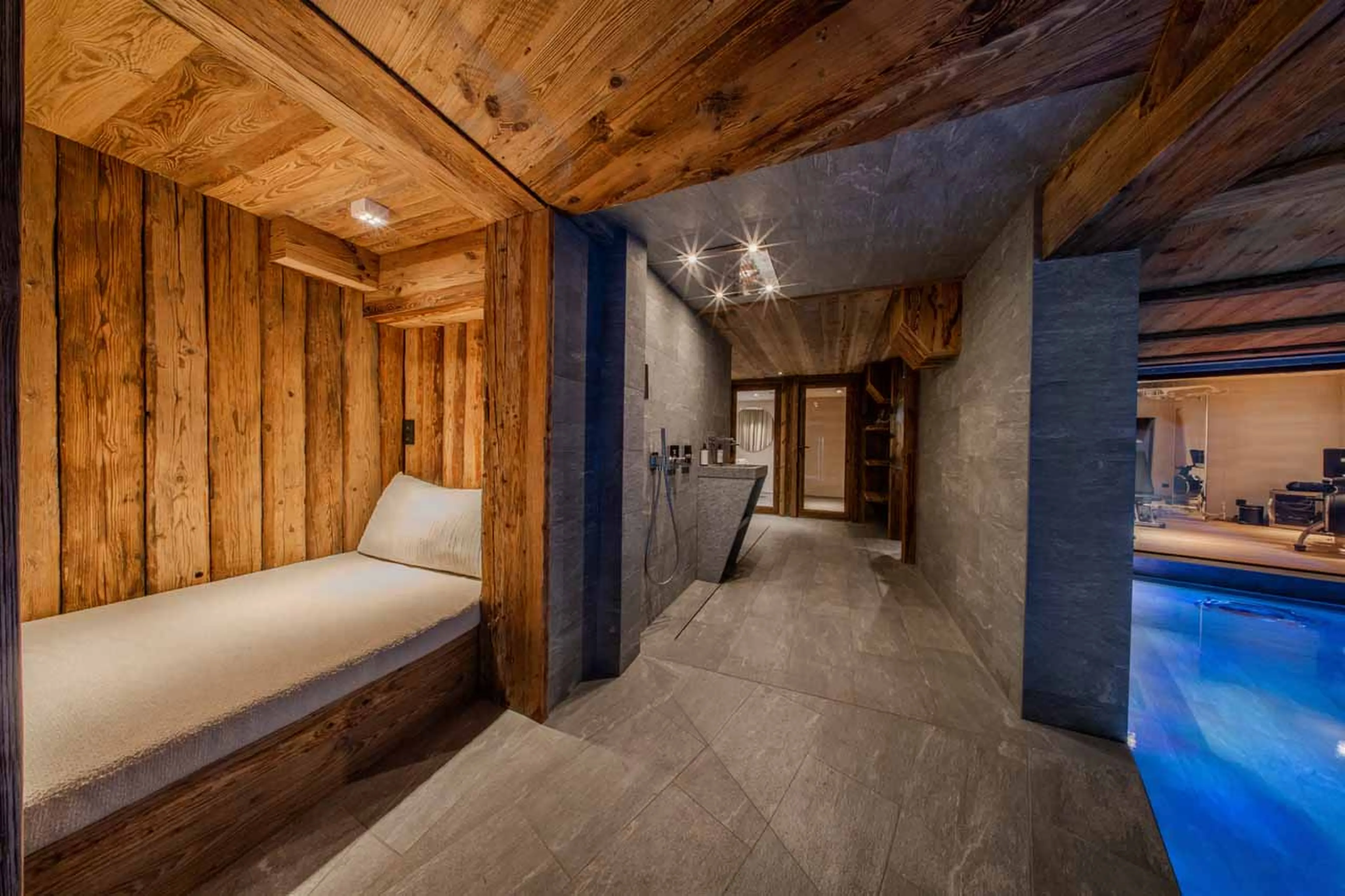 Relaxation area beside pool at Chalet Orso in Val d'Isere