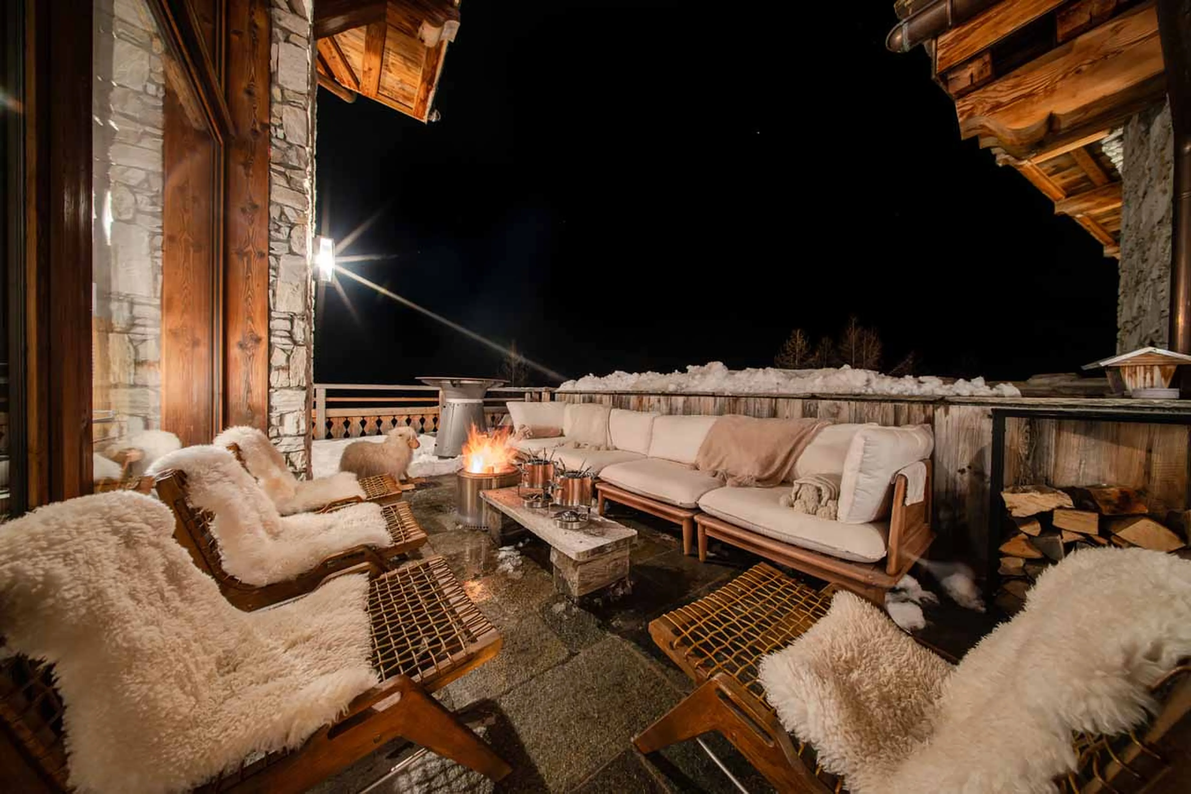Terrace with firepit at Chalet Orso in Val d'Isere