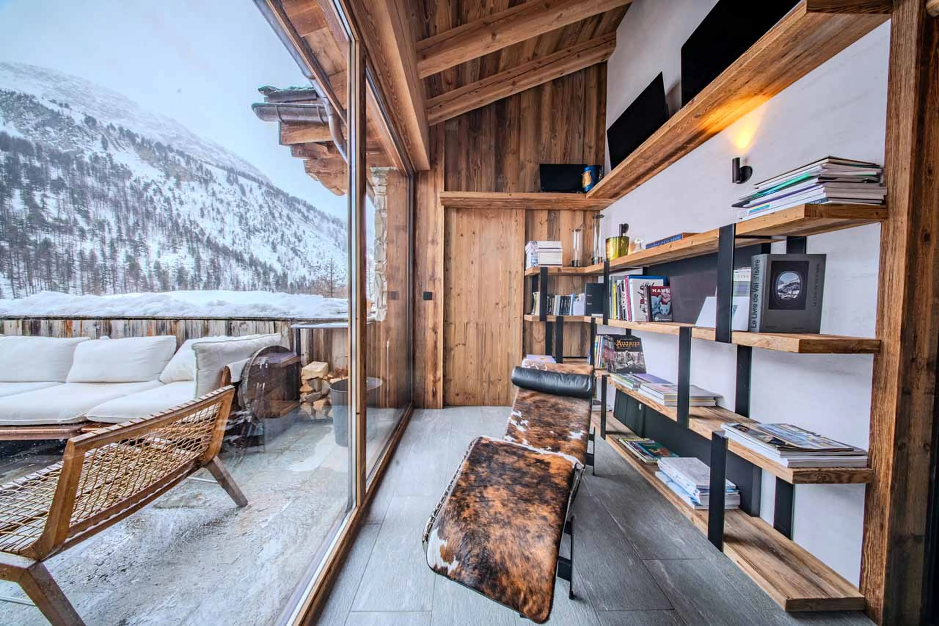 Library area & terrace at Chalet Orso in Val d'Isere