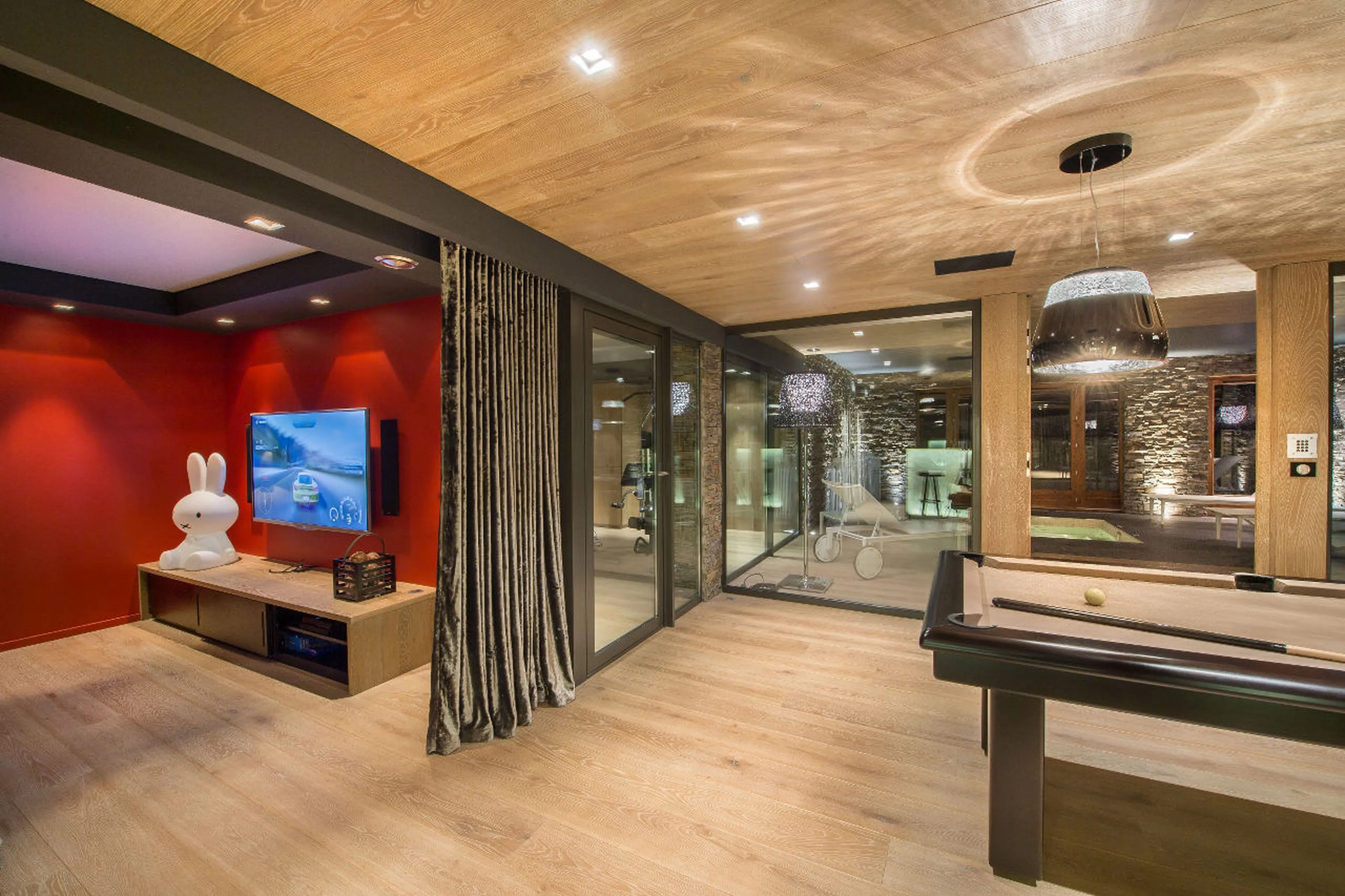 Home cinema room next to games room in Chalet Overview in Courchevel 1650