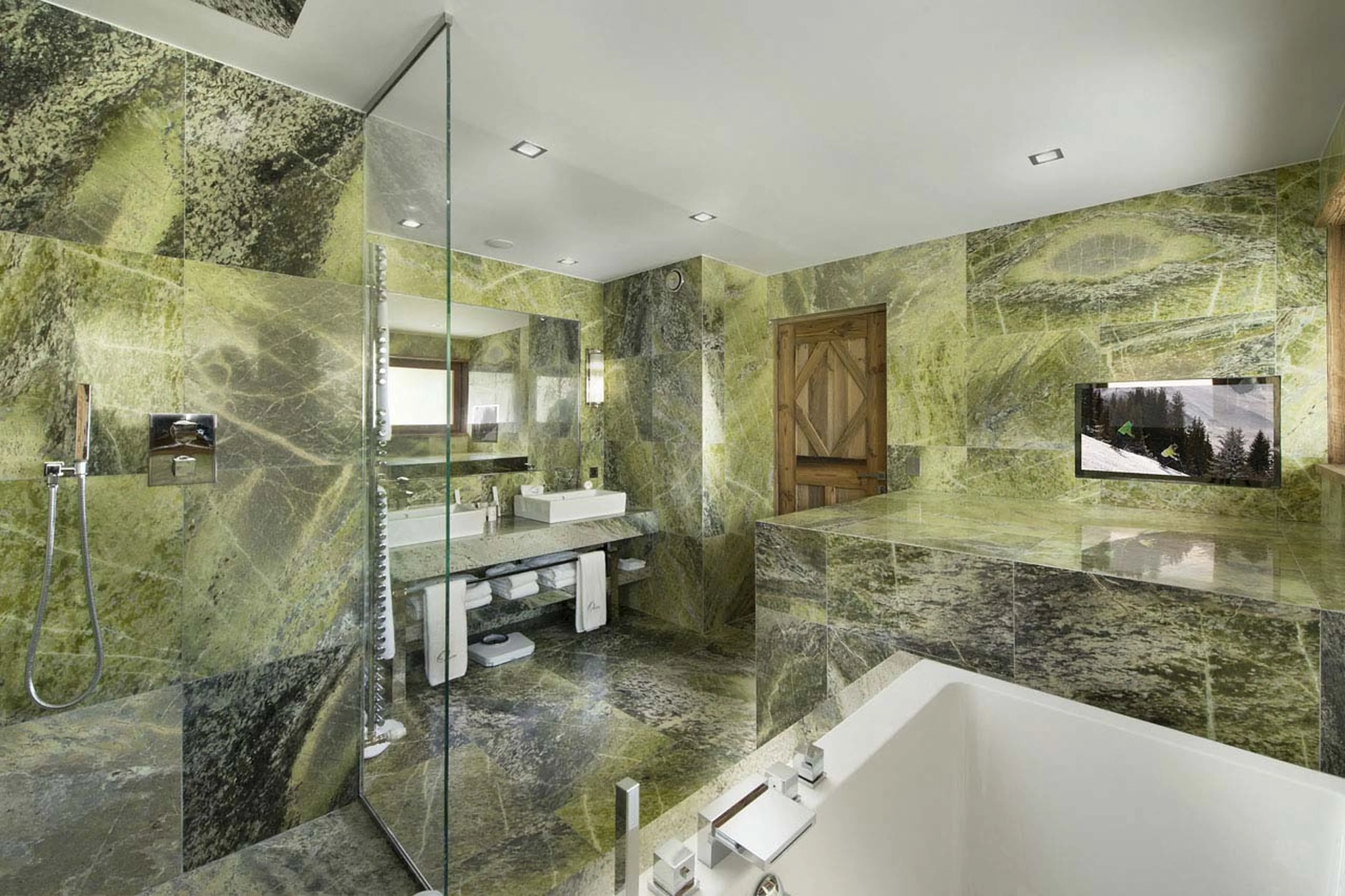 Granite en suite bathroom with twin basins in Chalet Owens of Courchevel 1850
