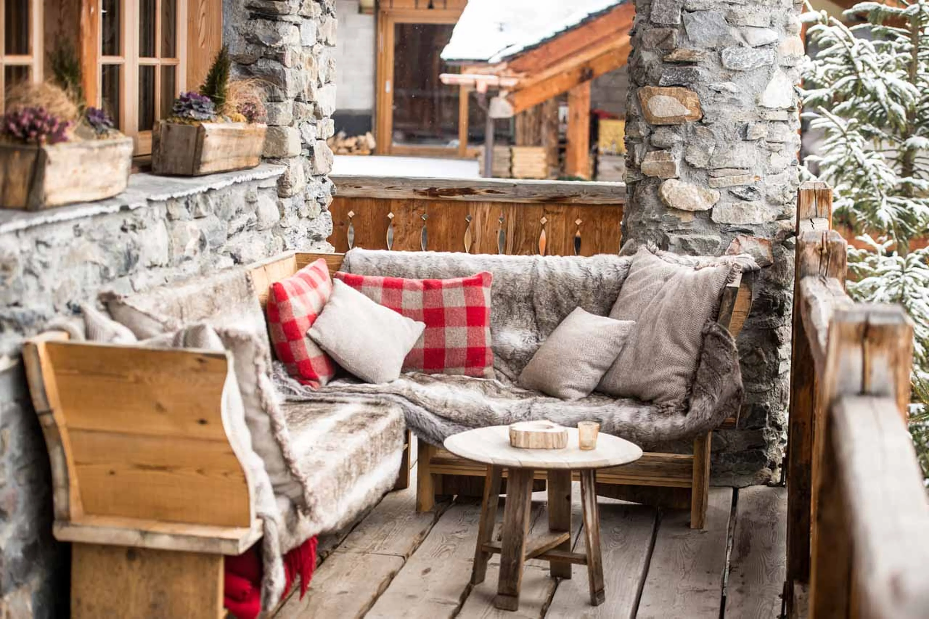 Terrace seating at Chalet Pelerin in Le Miroir