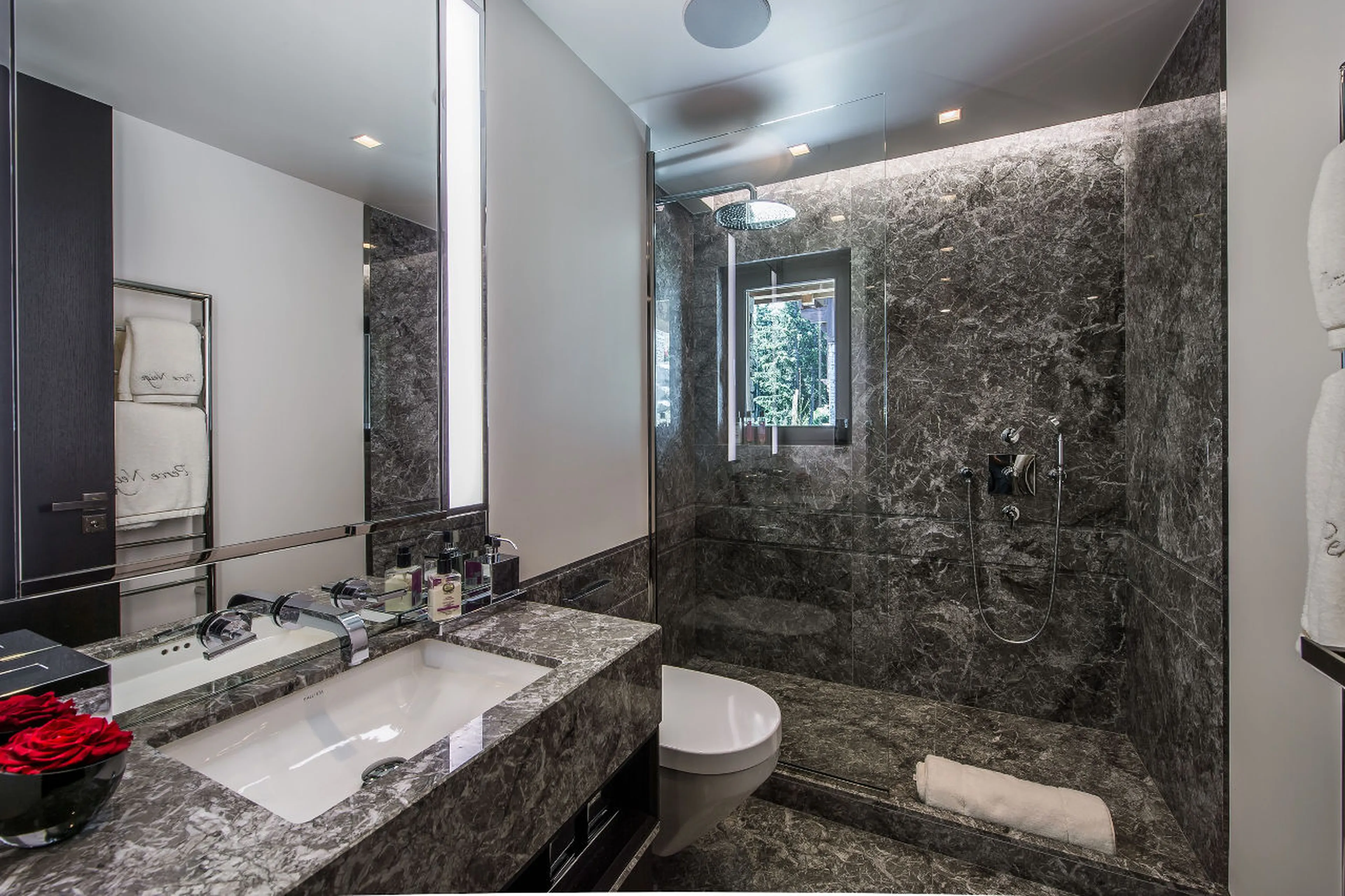 Shower room with granite finishes in Chalet Perce Neige, Courchevel 1850