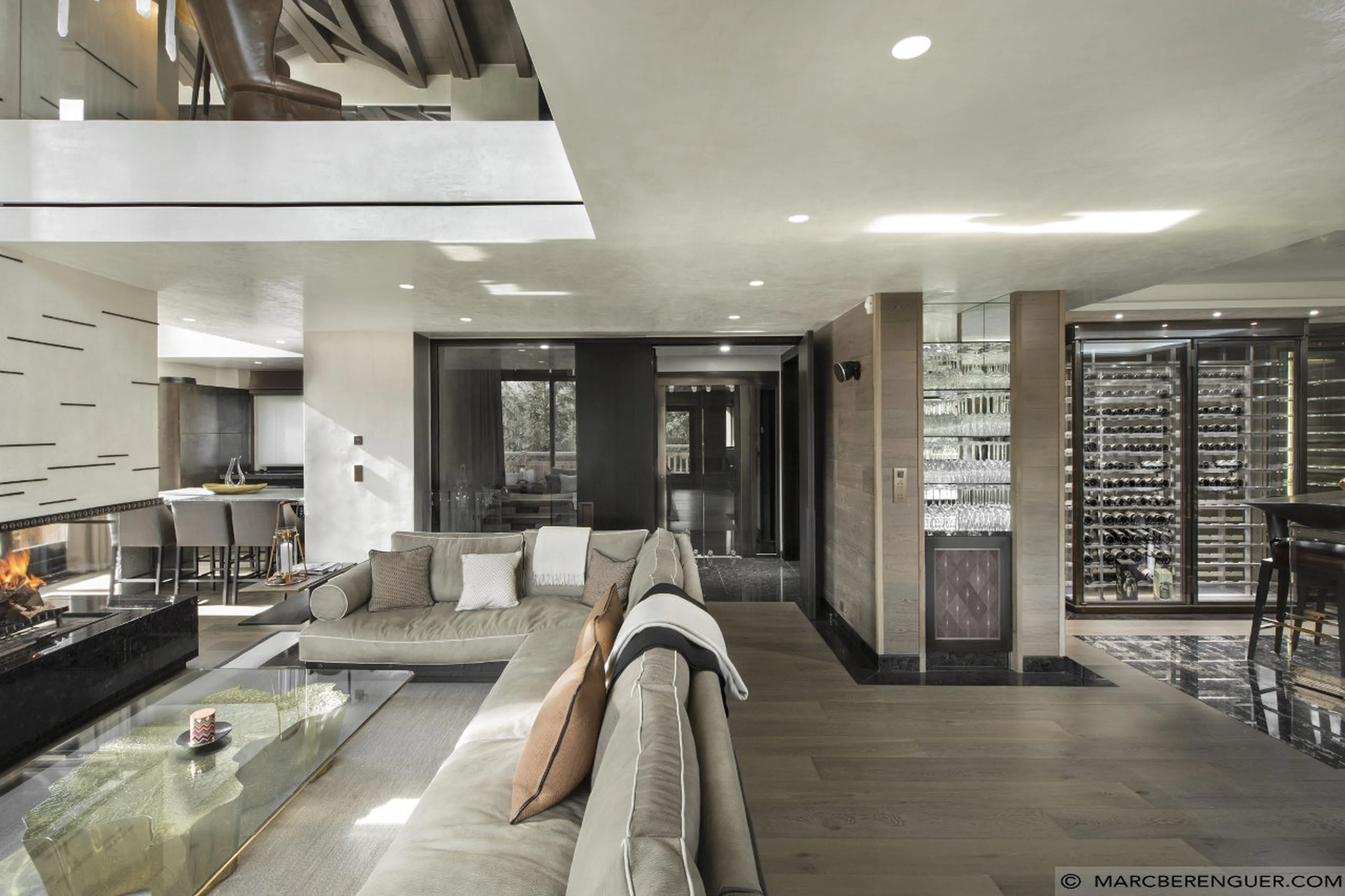 Open plan living area with wine cellar in Chalet Perce Neige, Courchevel 1850