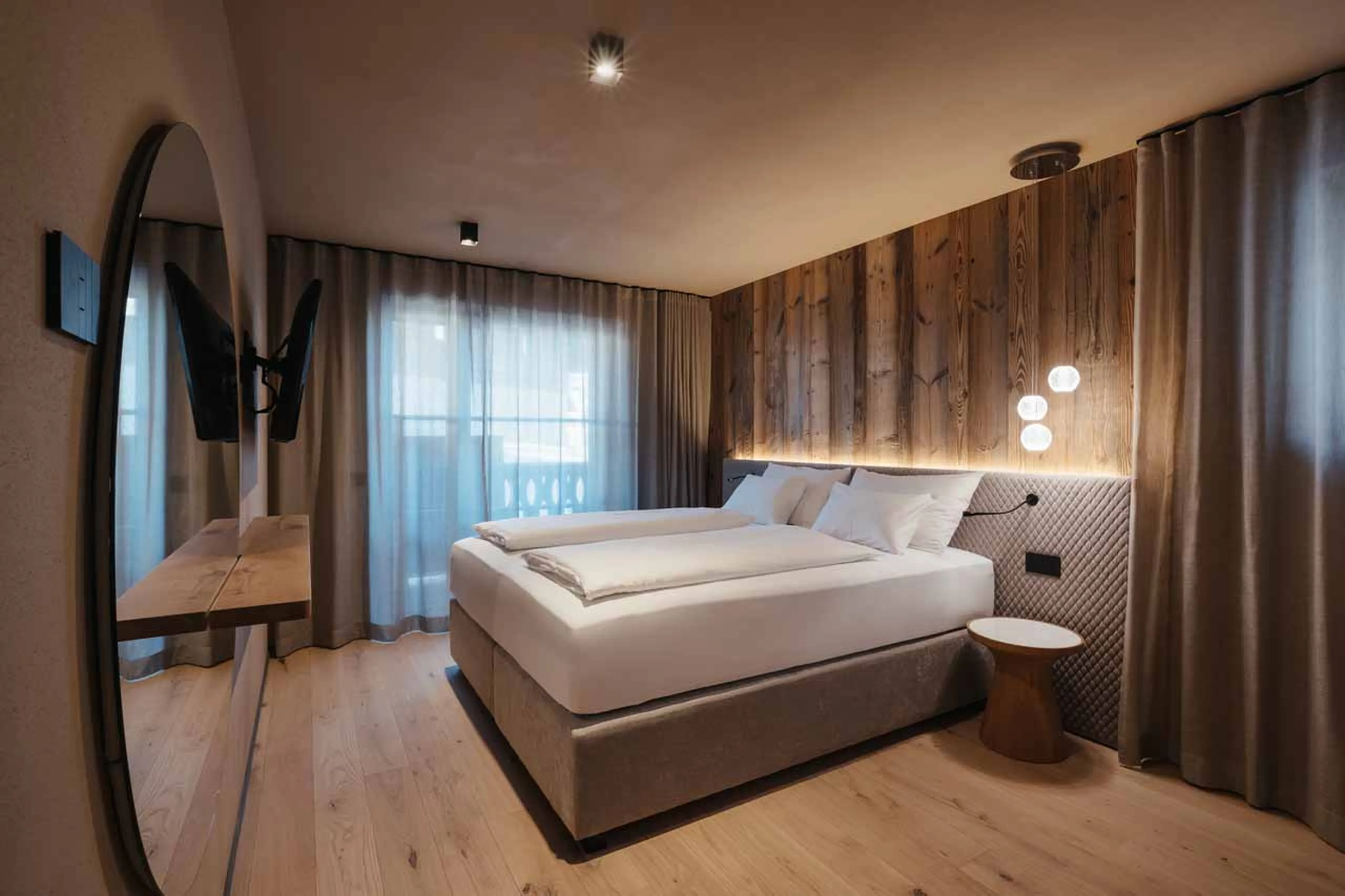Bedroom one at Chalet Pescosta in Kronplatz