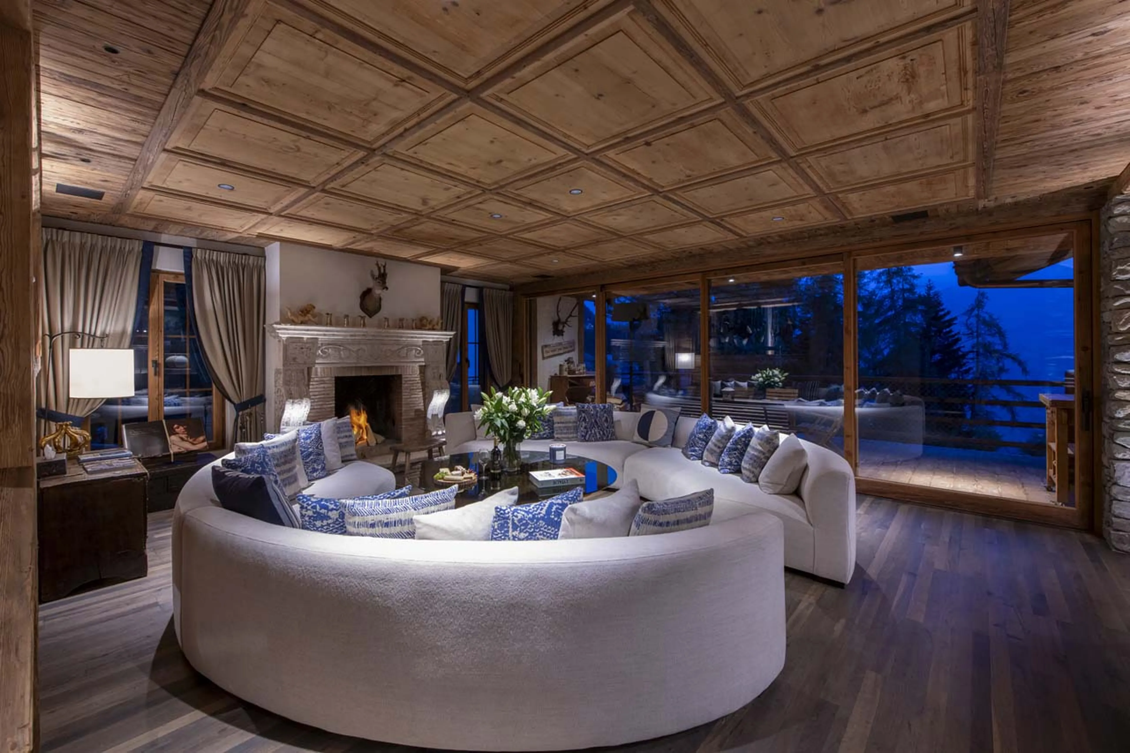 Living area opening onto terrace at Chalet Peter Pan in Verbier