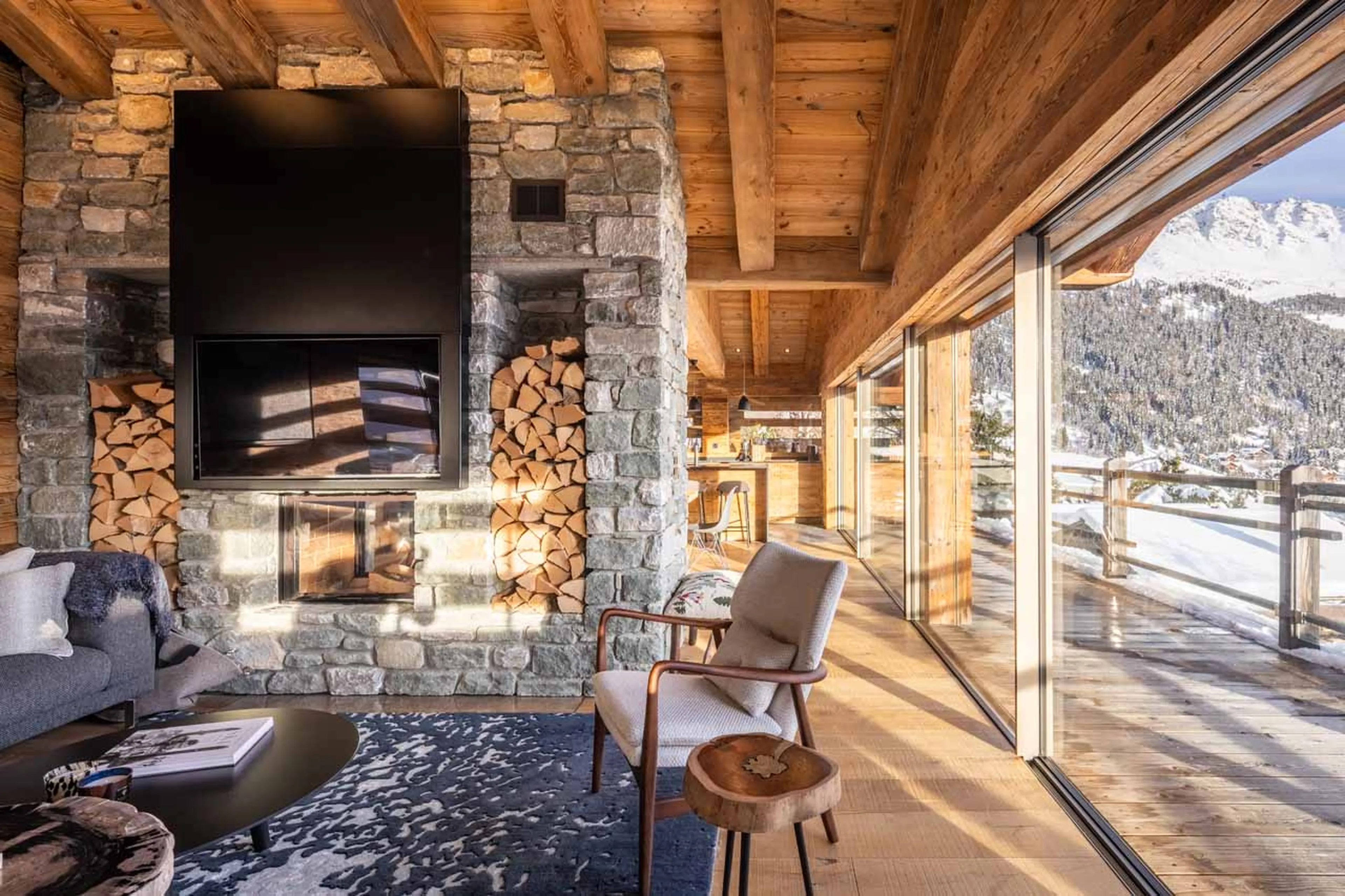 Wood-burning fireplace at Chalet Petheo in Verbier