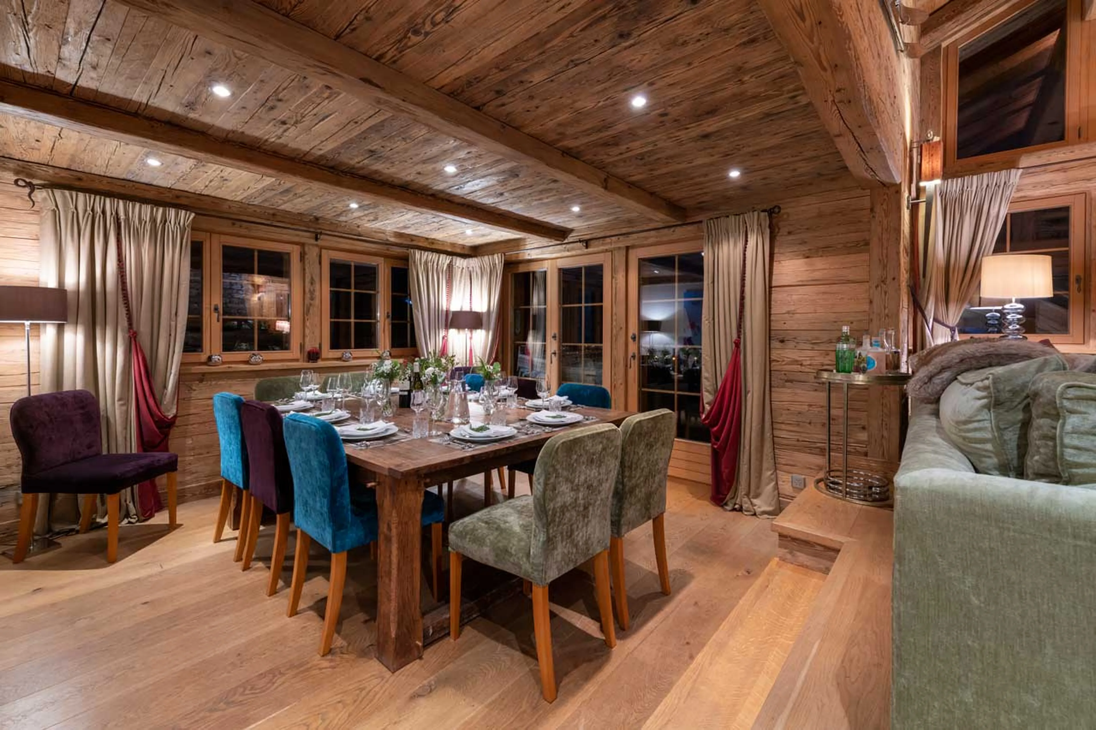 Dining area at night at Chalet Petit Ours in Verbier