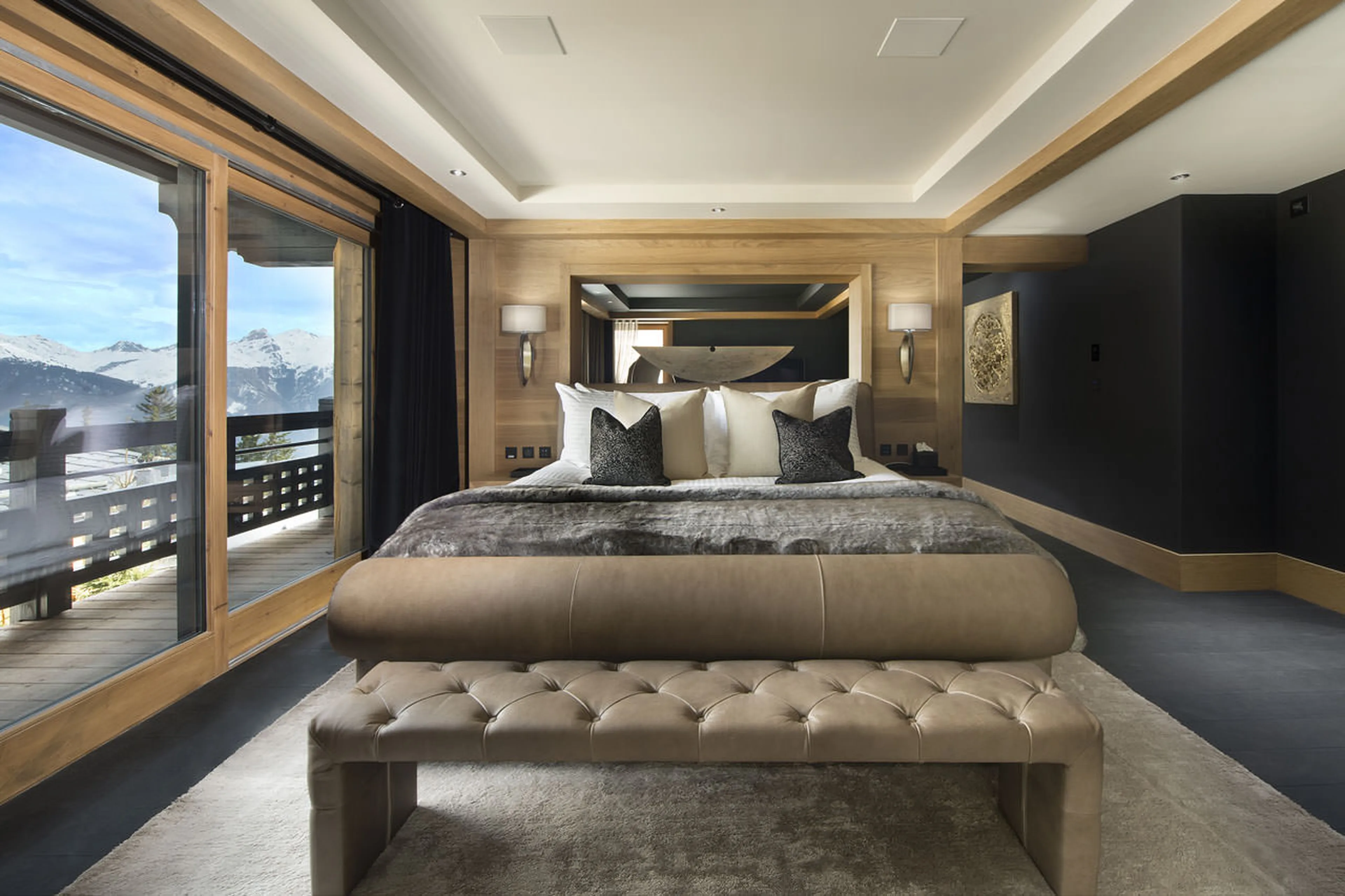 Master bedroom suite with private terrace access in chalet Le Petit Palais in Courchevel 1850