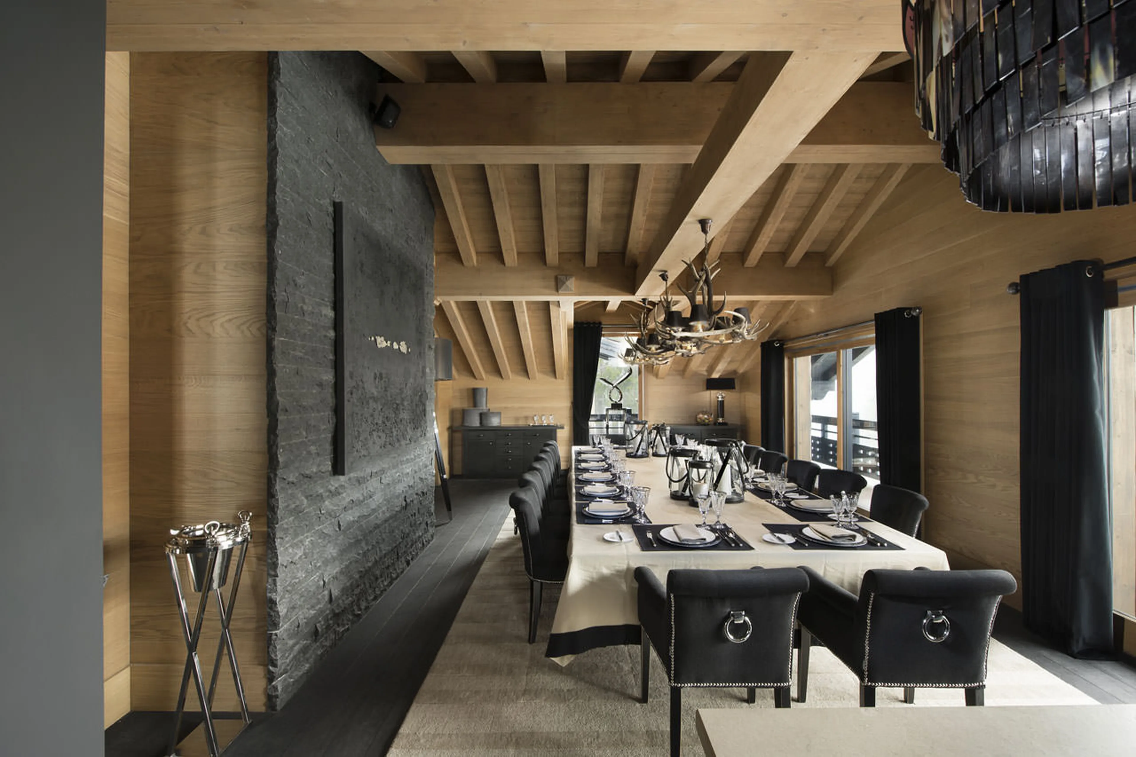 Dining room seating fourteen guests in chalet Le Petit Palais in Courchevel 1850