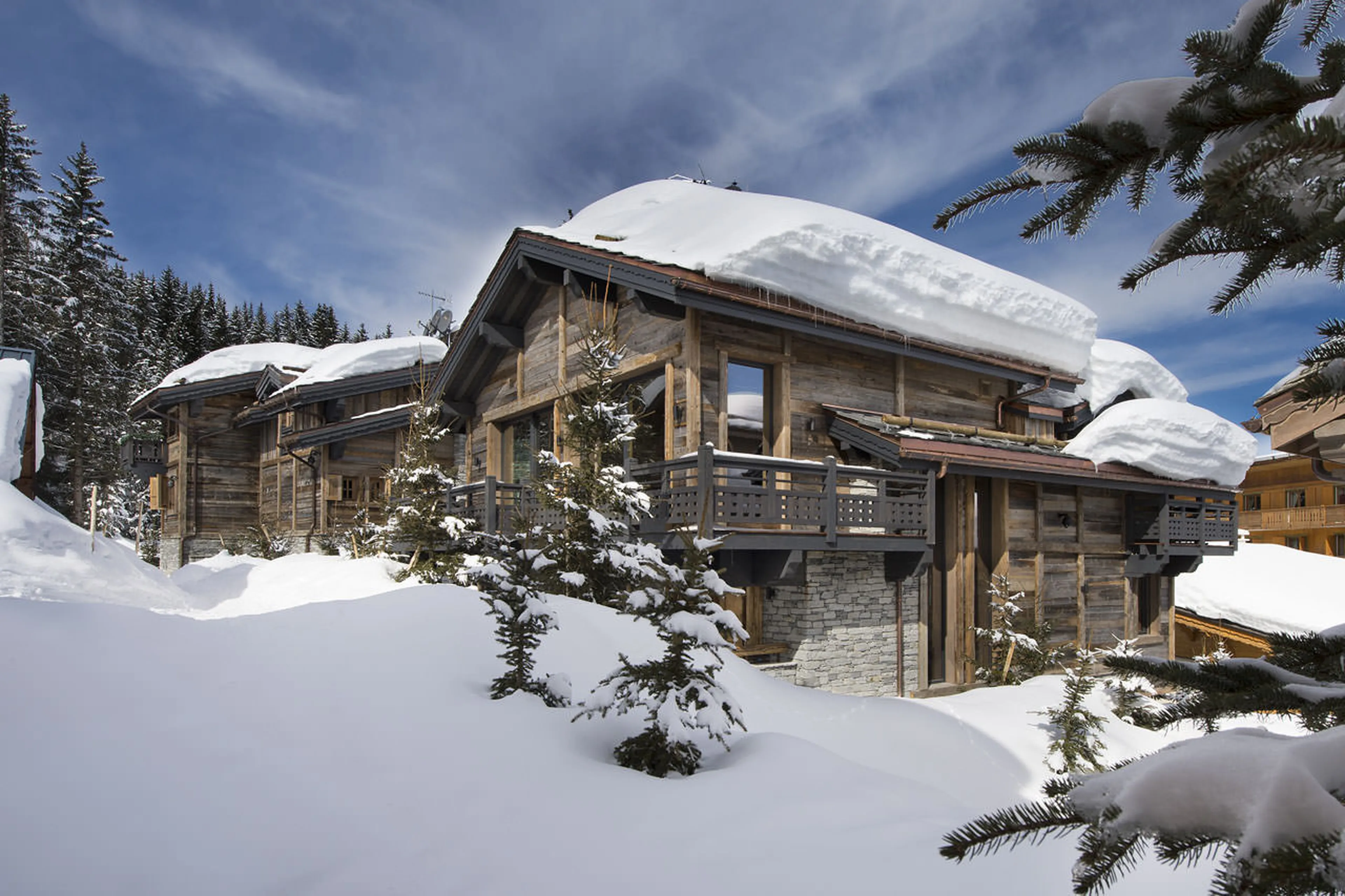 Exterior view of Chalet Le Petit Palais in Courchevel 1850 in its beautiful setting