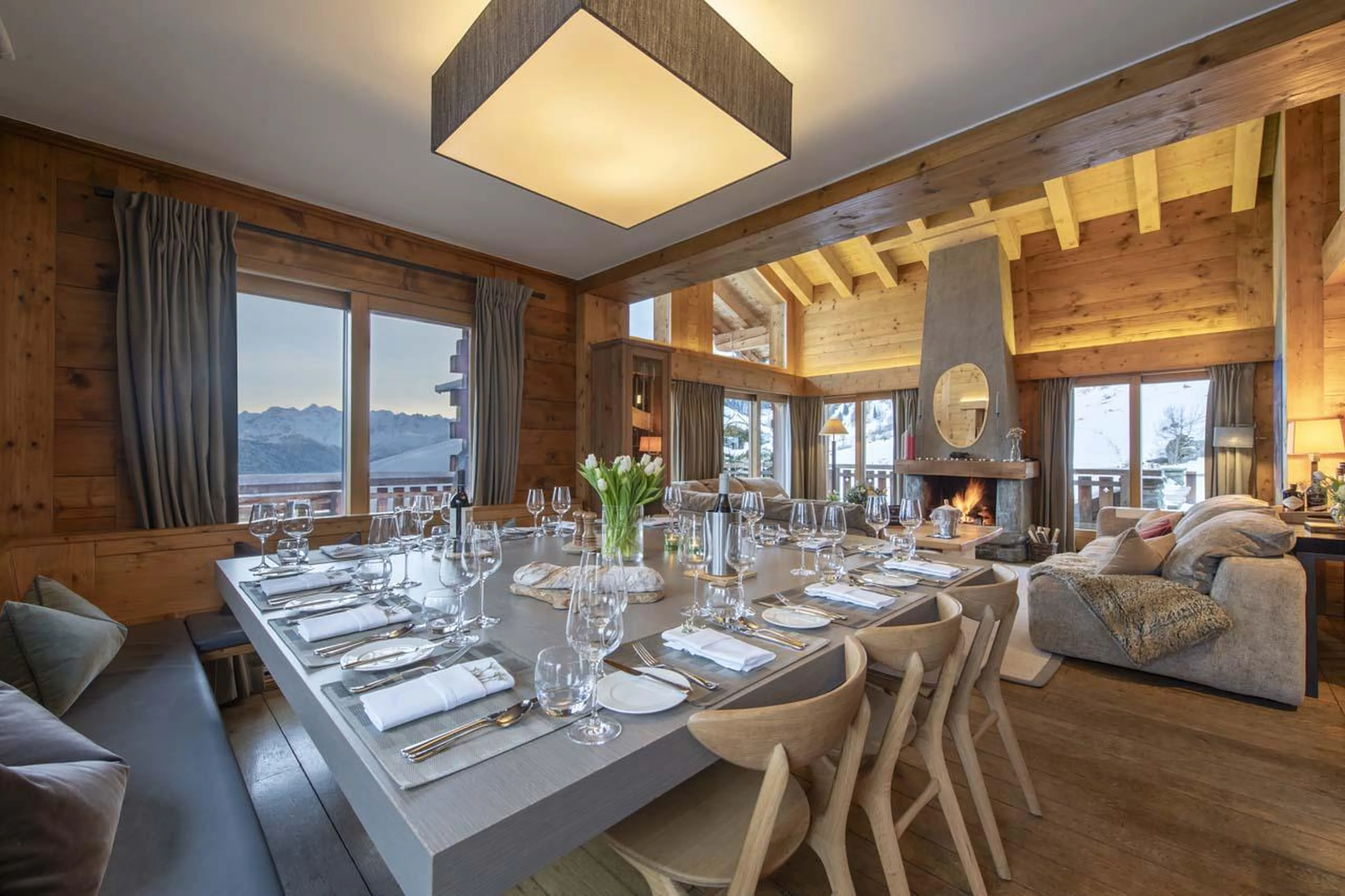 Open-plan living space with modern alpine feel at Chalet Pierre Avoi in Verbier